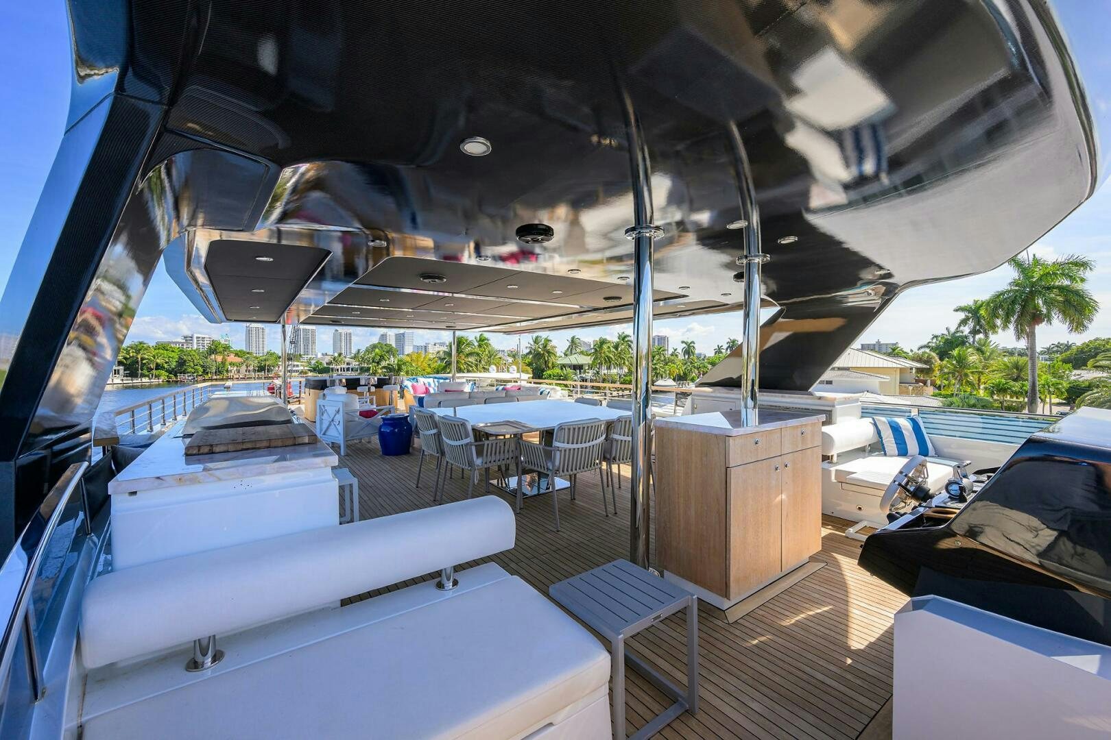 a tent with tables and chairs aboard AMORE Yacht for Sale