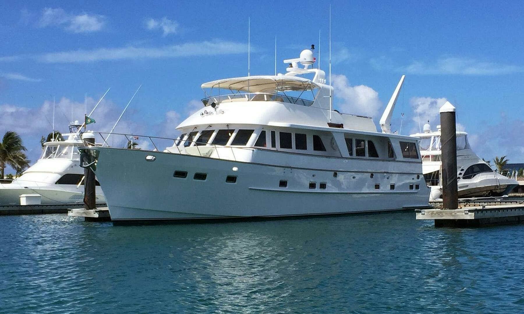 a large white boat in the water aboard SHAMROCK Yacht for Sale