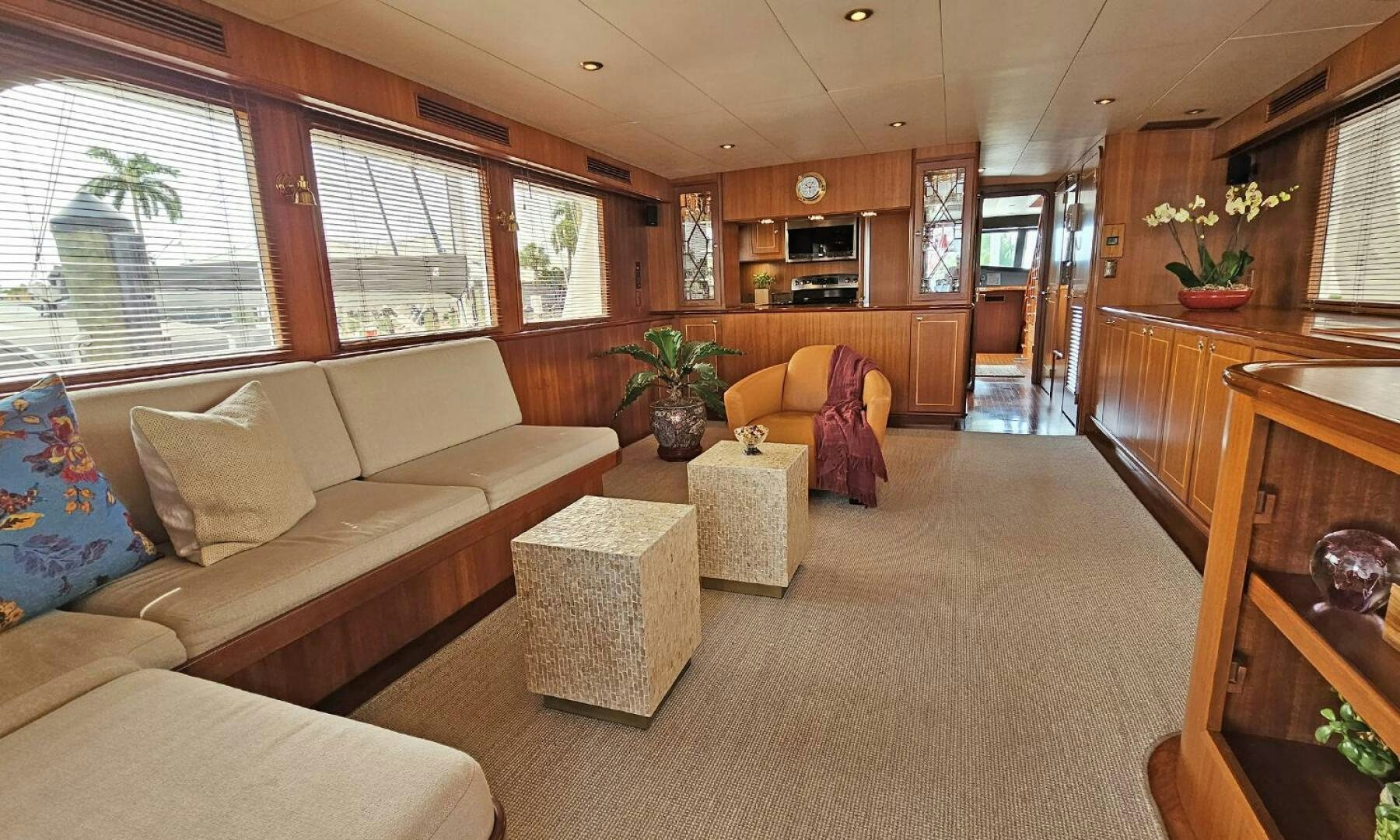 a living room with a couch and a table aboard SHAMROCK Yacht for Sale