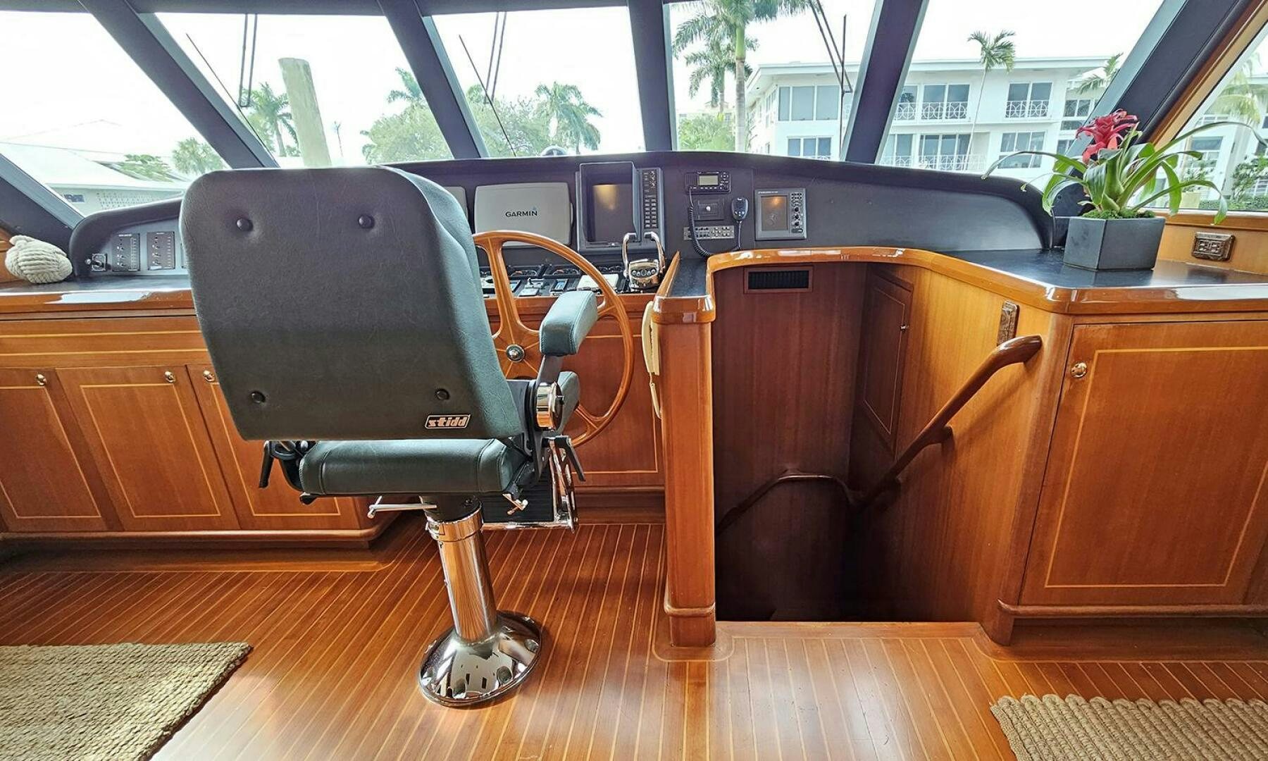 a black chair in a room aboard SHAMROCK Yacht for Sale