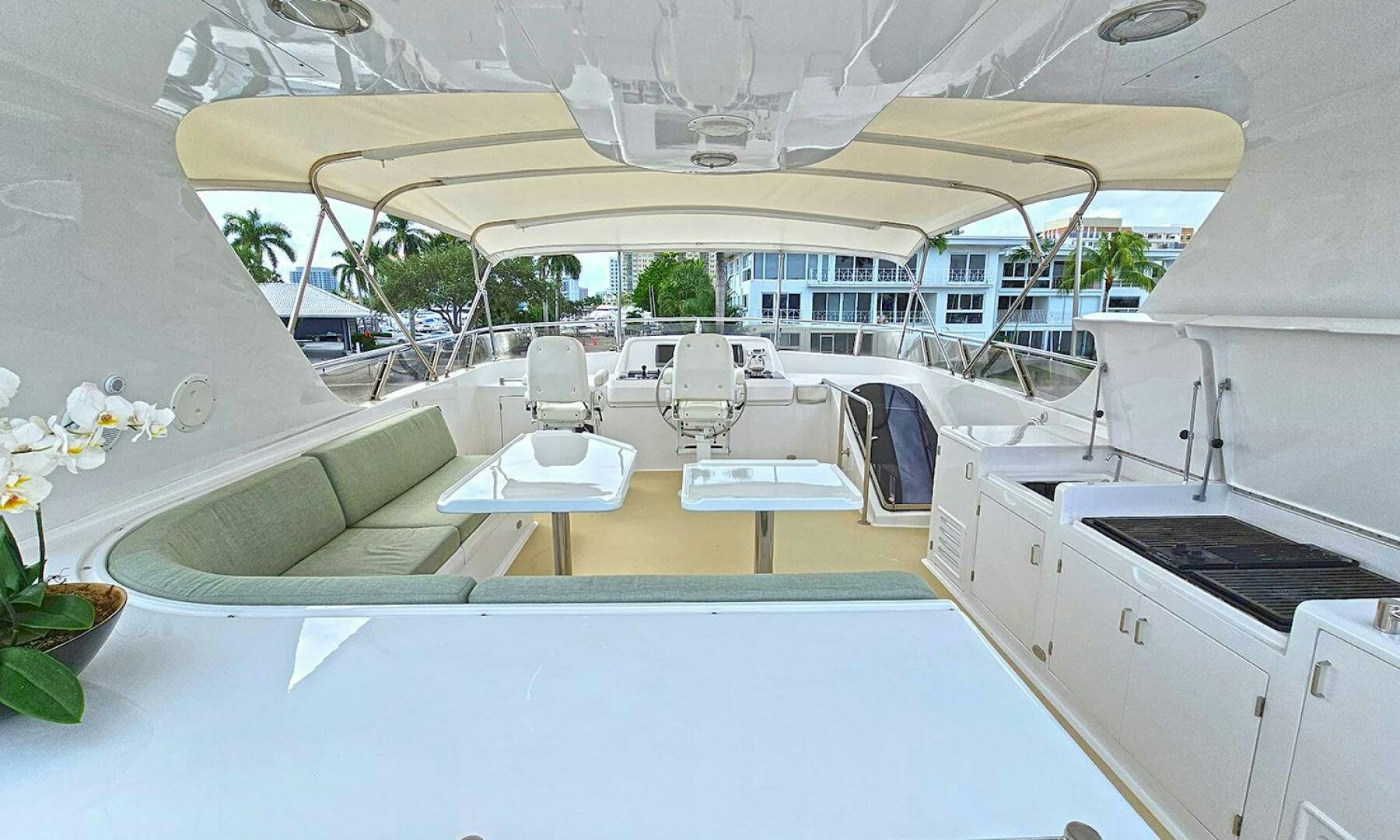 a large white tent with chairs and tables aboard SHAMROCK Yacht for Sale