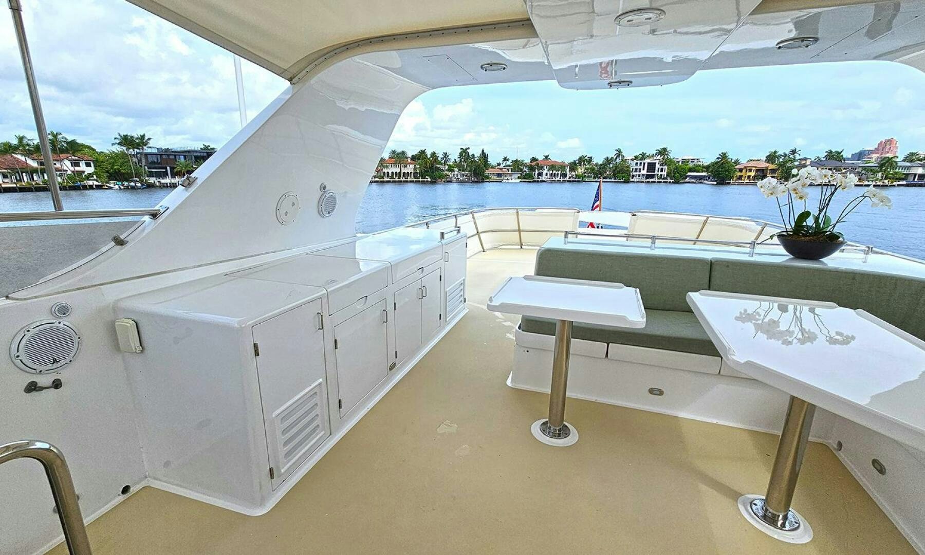 a room with a table and chairs aboard SHAMROCK Yacht for Sale