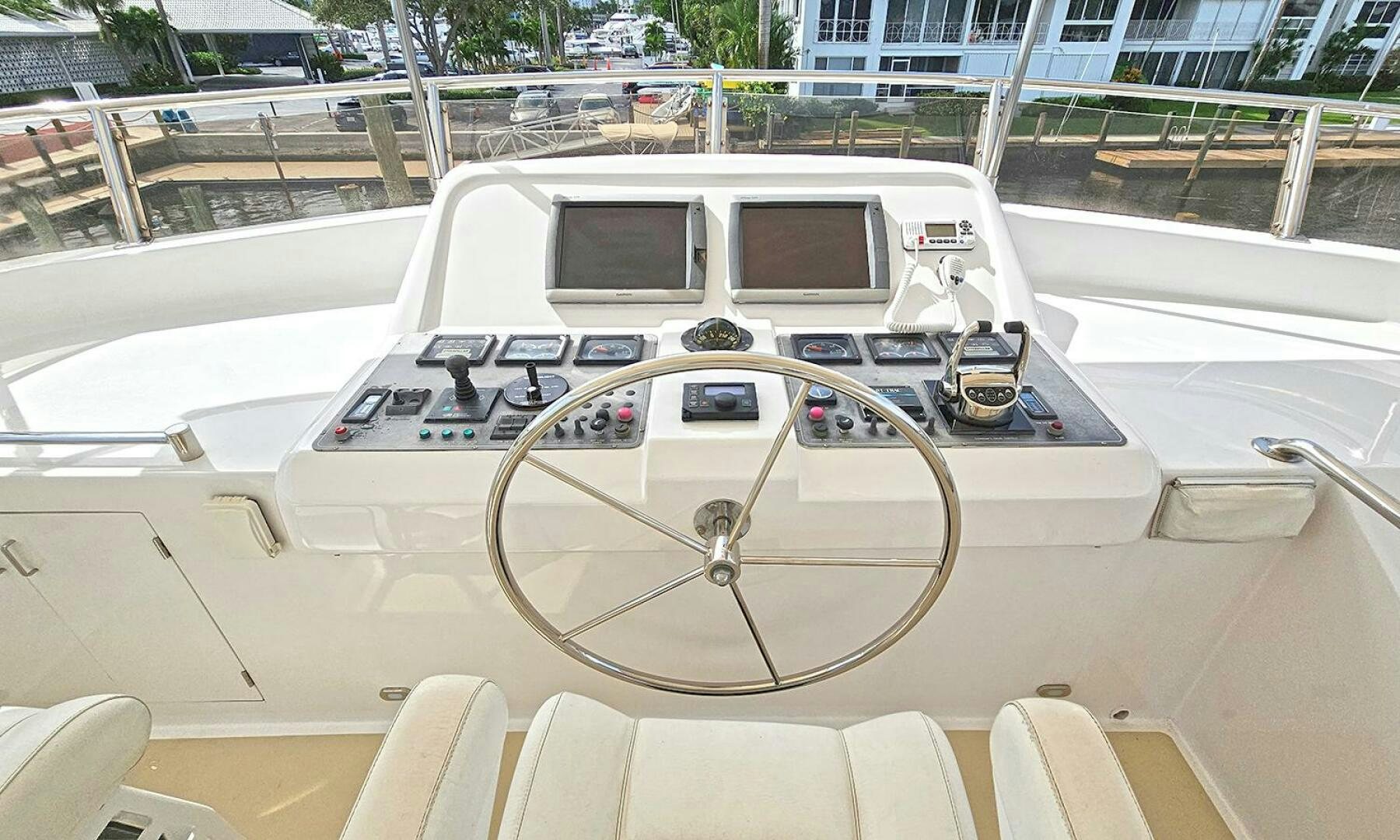 a white car on a road aboard SHAMROCK Yacht for Sale