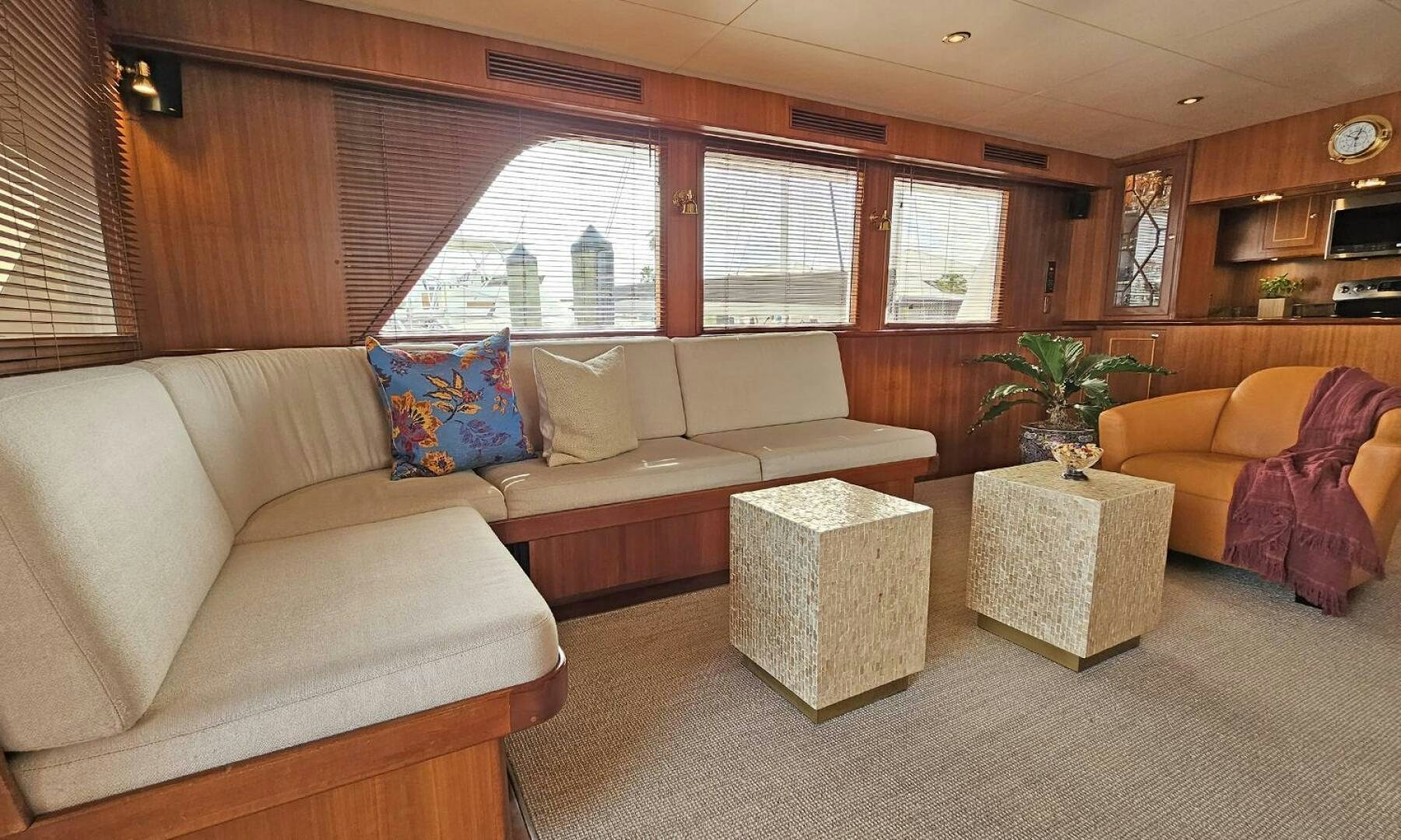 a living room with a couch and a table aboard SHAMROCK Yacht for Sale