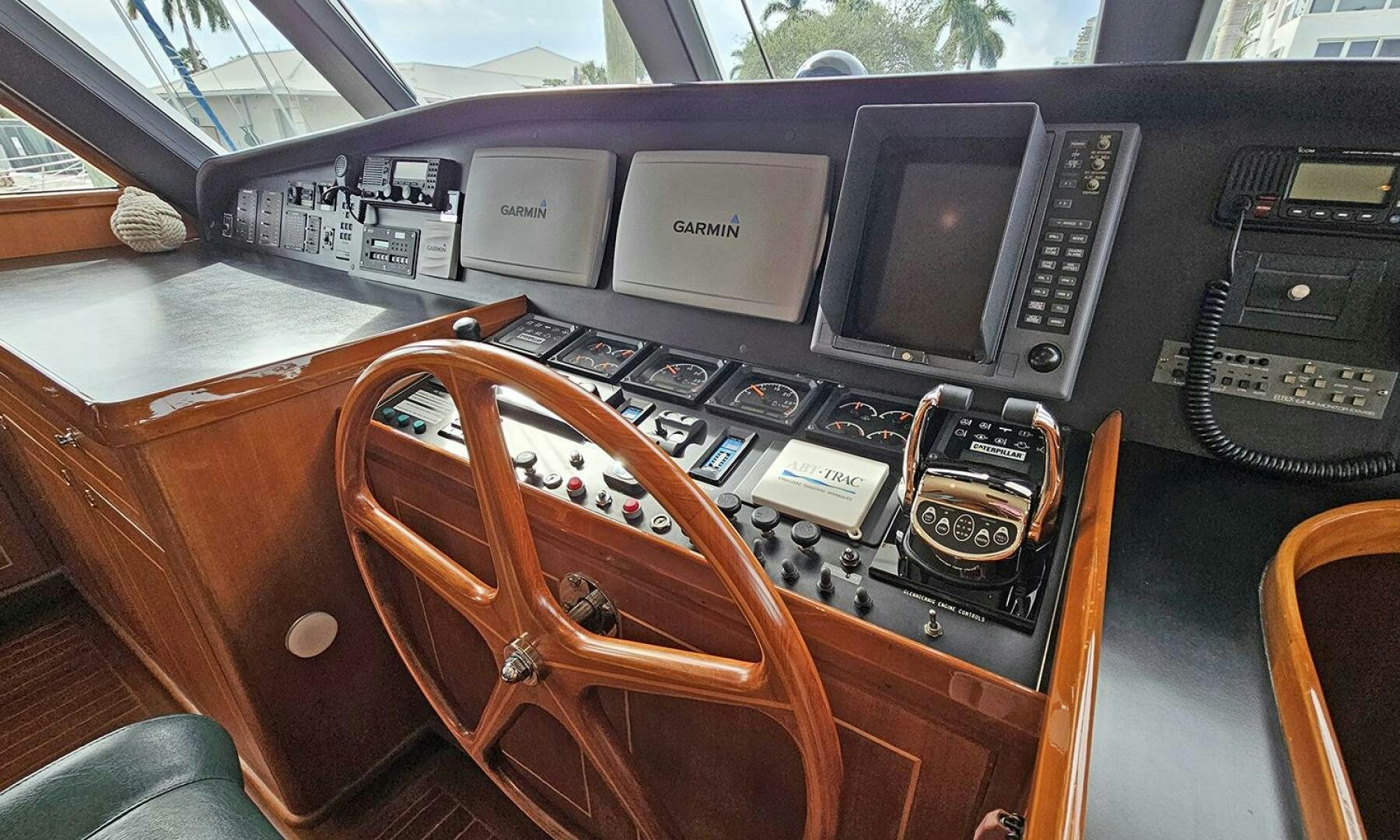 a wooden paneled panel with a radio and a wooden seat aboard SHAMROCK Yacht for Sale