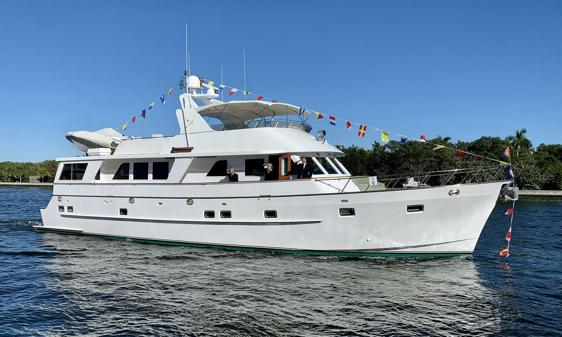 a white boat on the water aboard SHAMROCK Yacht for Sale