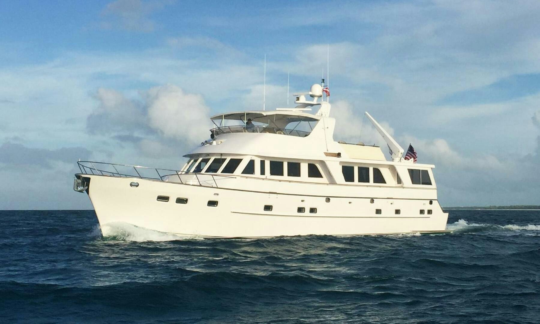 a white boat in the water aboard SHAMROCK Yacht for Sale