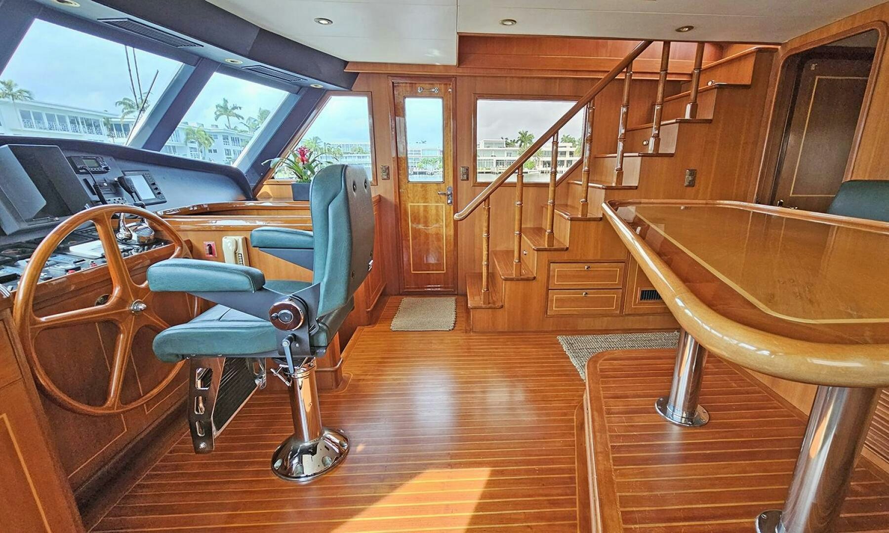 a room with chairs and a table aboard SHAMROCK Yacht for Sale