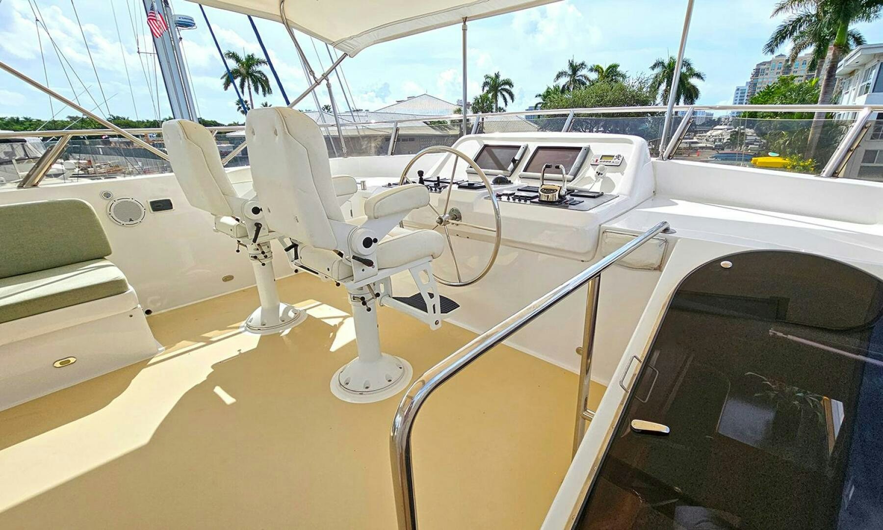 a white car with a steering wheel aboard SHAMROCK Yacht for Sale