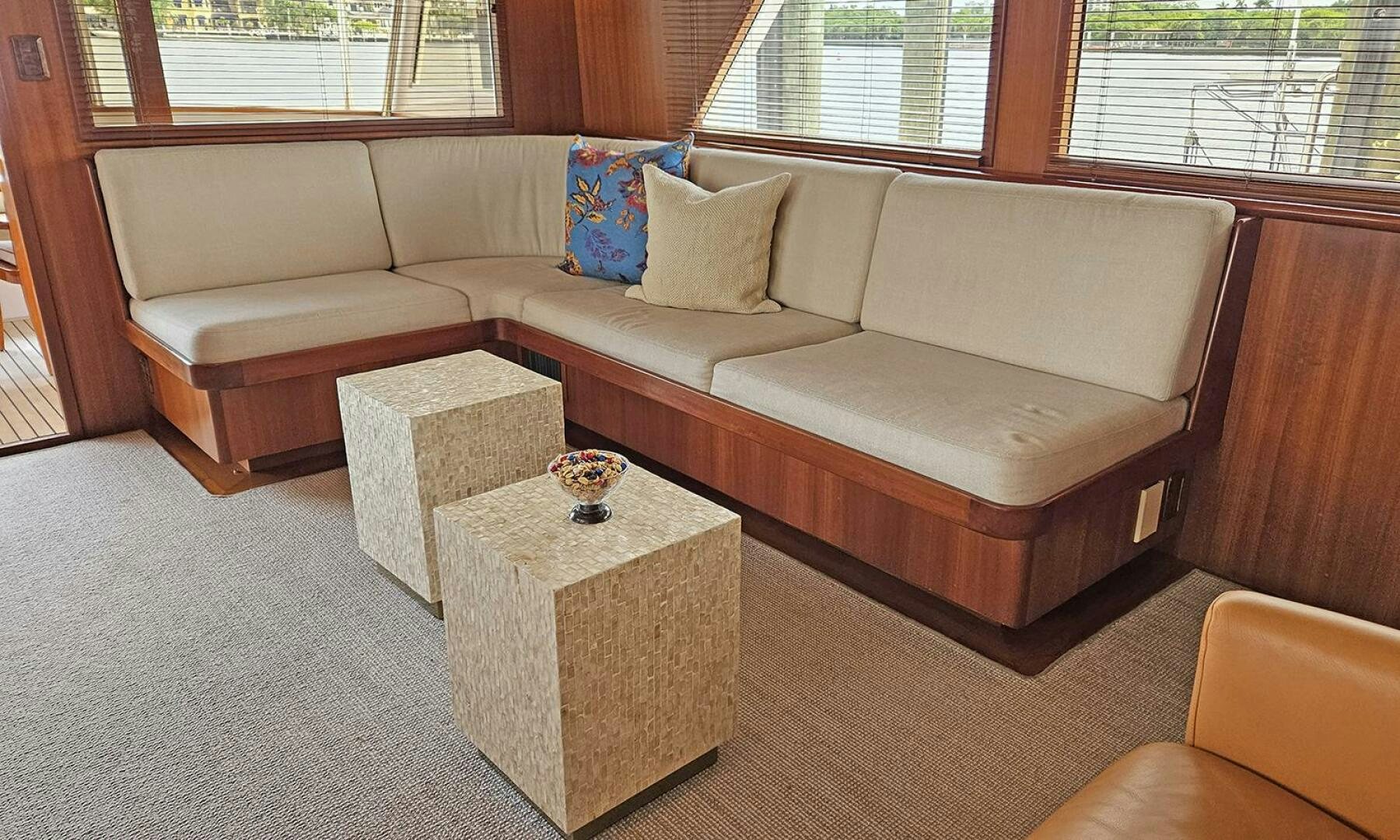a couch and coffee table in a room aboard SHAMROCK Yacht for Sale