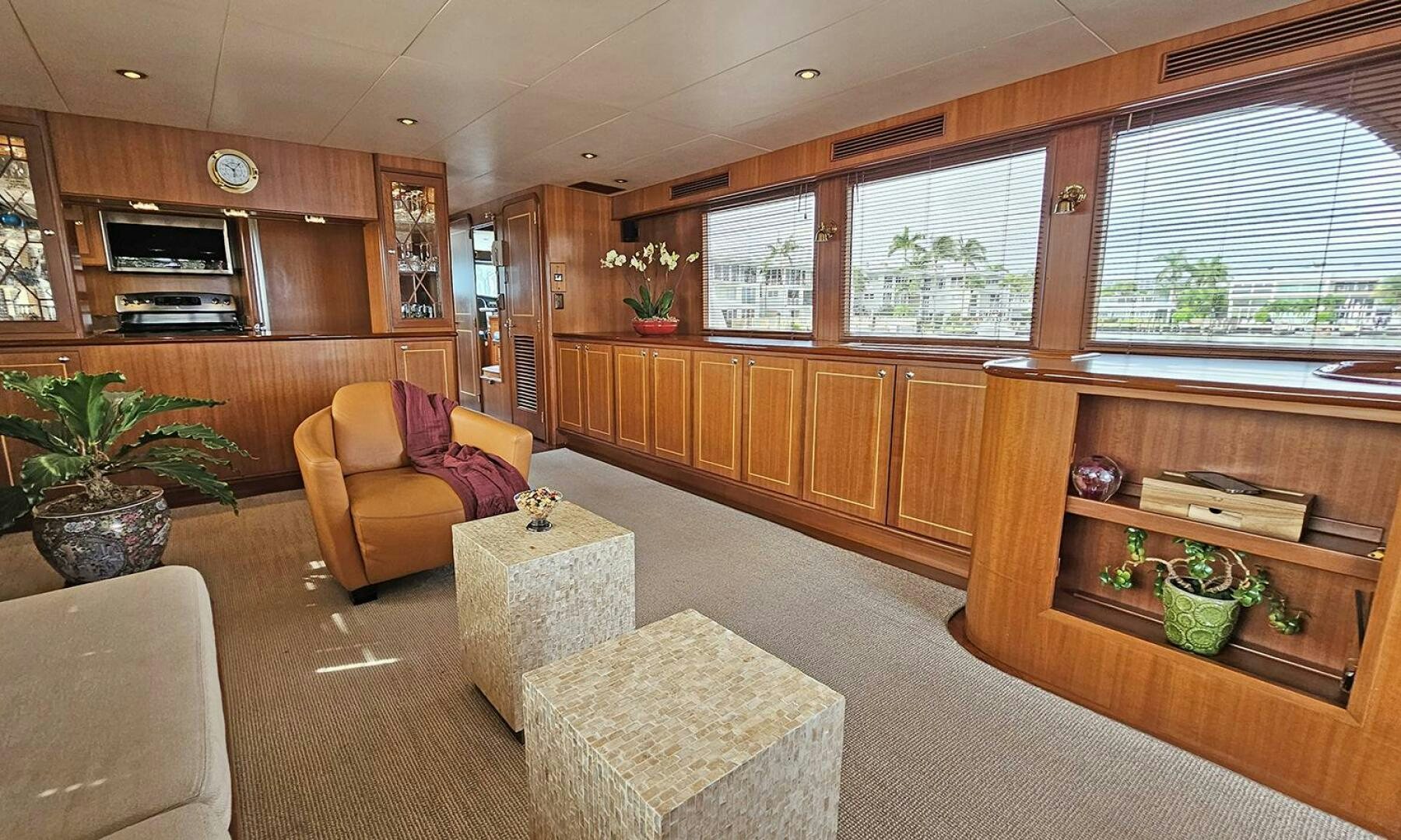 a living room with a couch and a table aboard SHAMROCK Yacht for Sale