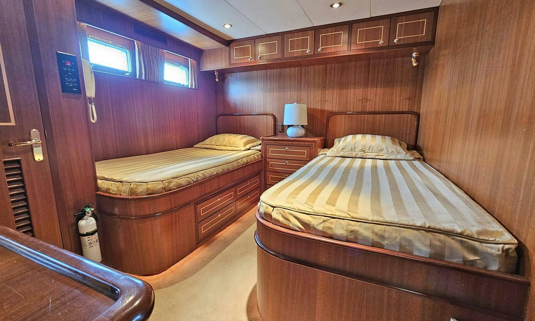 a room with two beds aboard SHAMROCK Yacht for Sale
