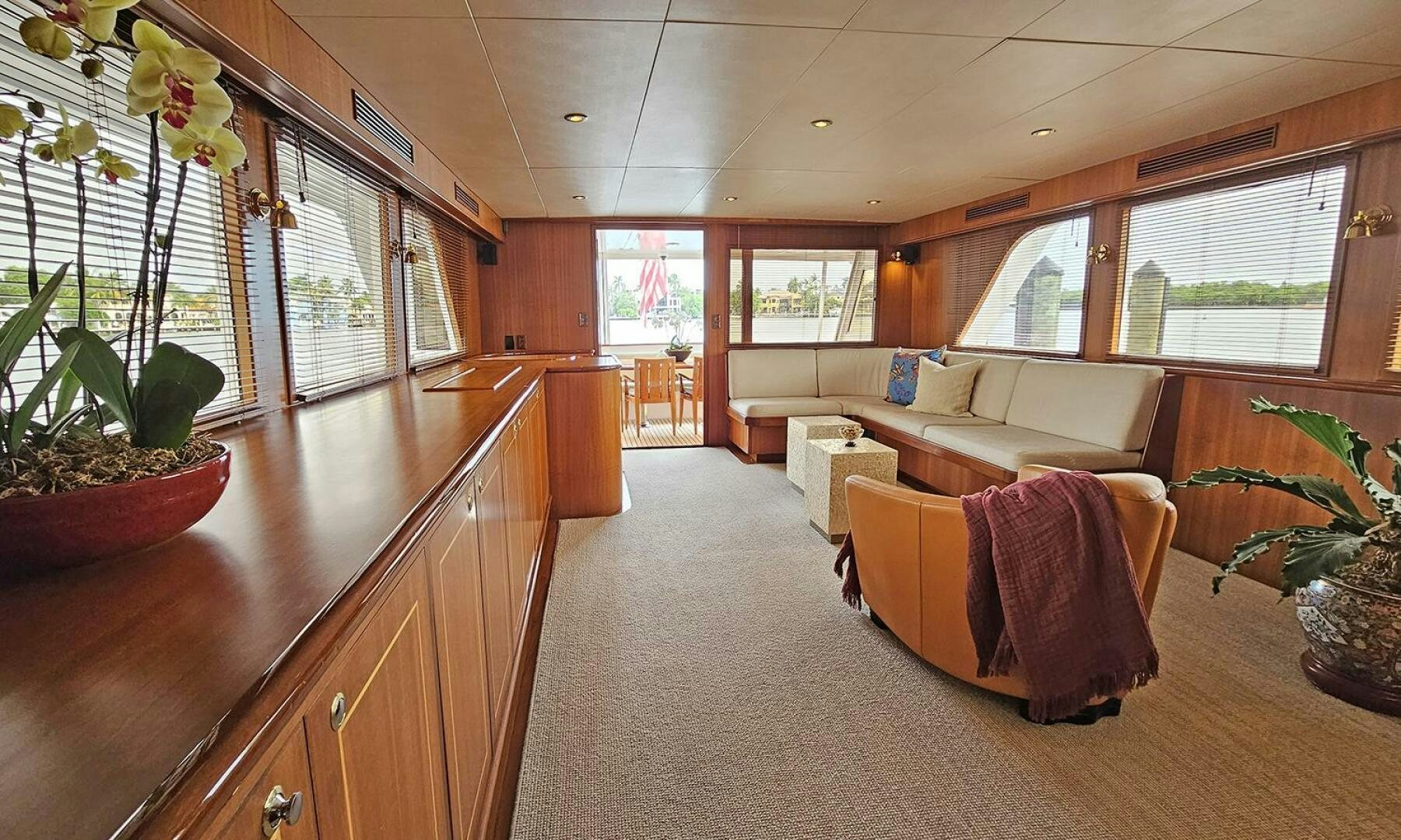 a large room with a couch and a table aboard SHAMROCK Yacht for Sale