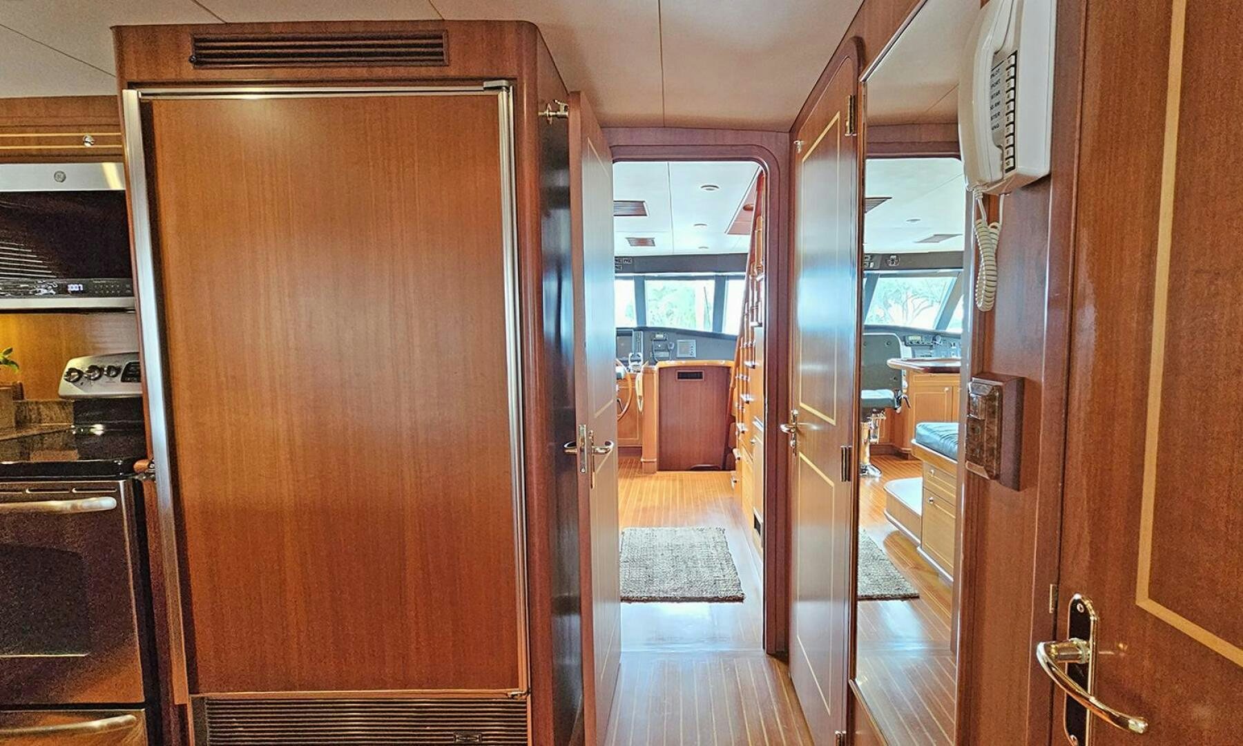 a room with wooden cabinets aboard SHAMROCK Yacht for Sale