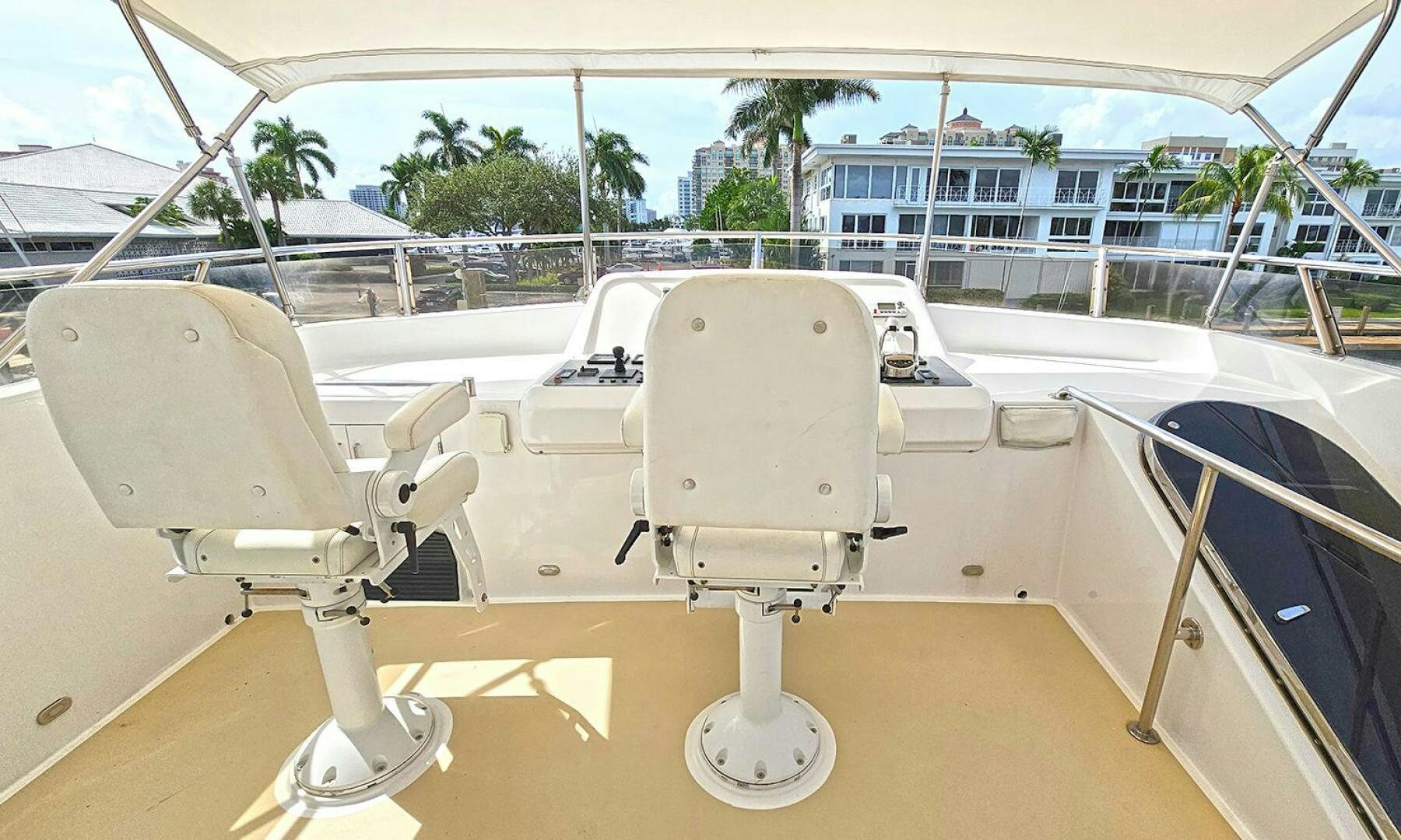 a white boat on a deck aboard SHAMROCK Yacht for Sale