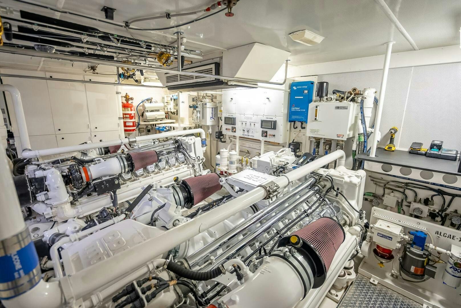 a room with machinery aboard SERENITY Yacht for Sale