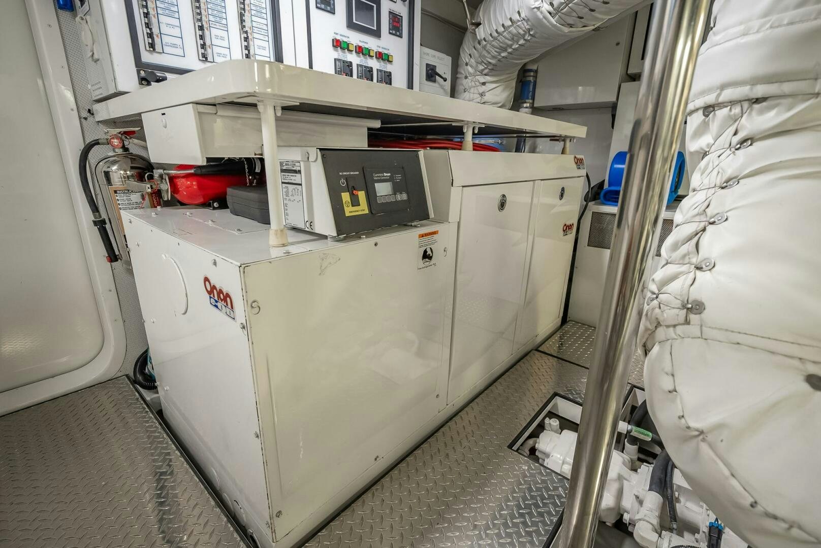 a large white machine aboard SERENITY Yacht for Sale