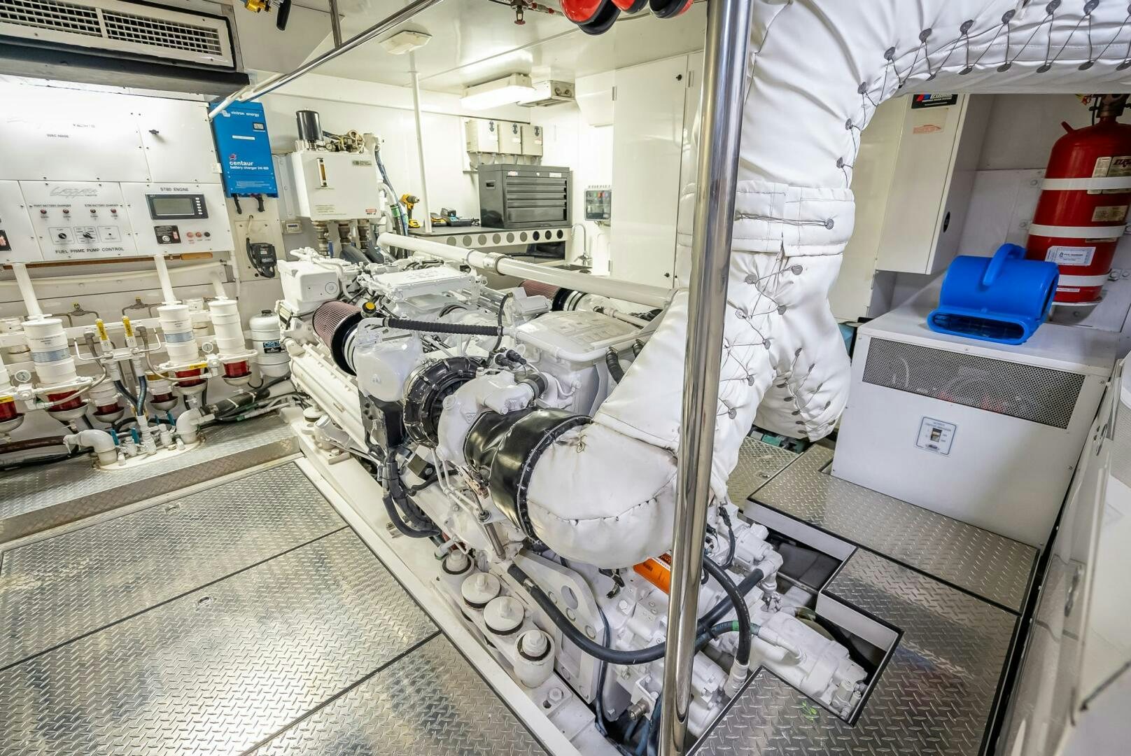 a large white machine in a room aboard SERENITY Yacht for Sale