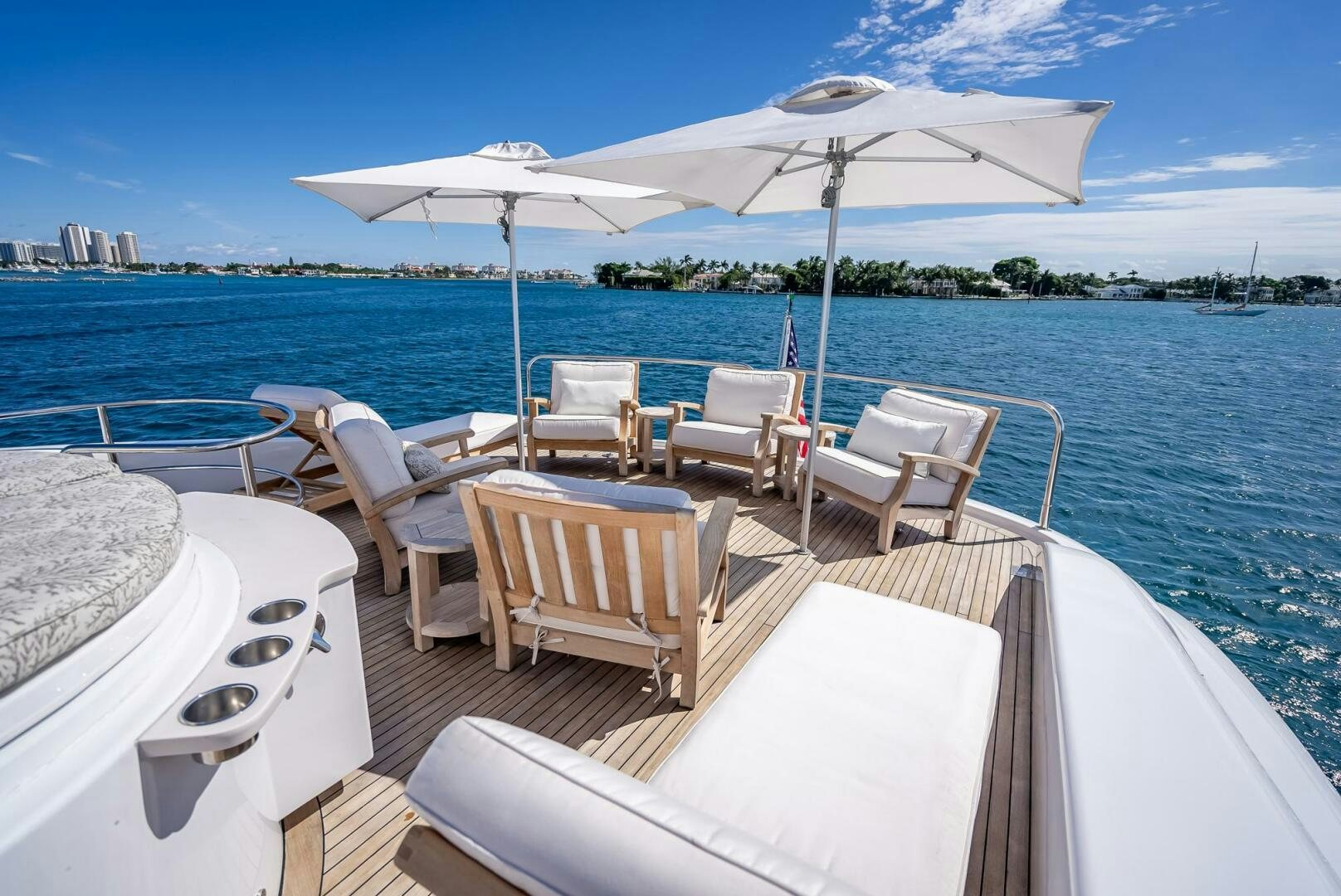 a boat with chairs and umbrellas on it aboard SERENITY Yacht for Sale