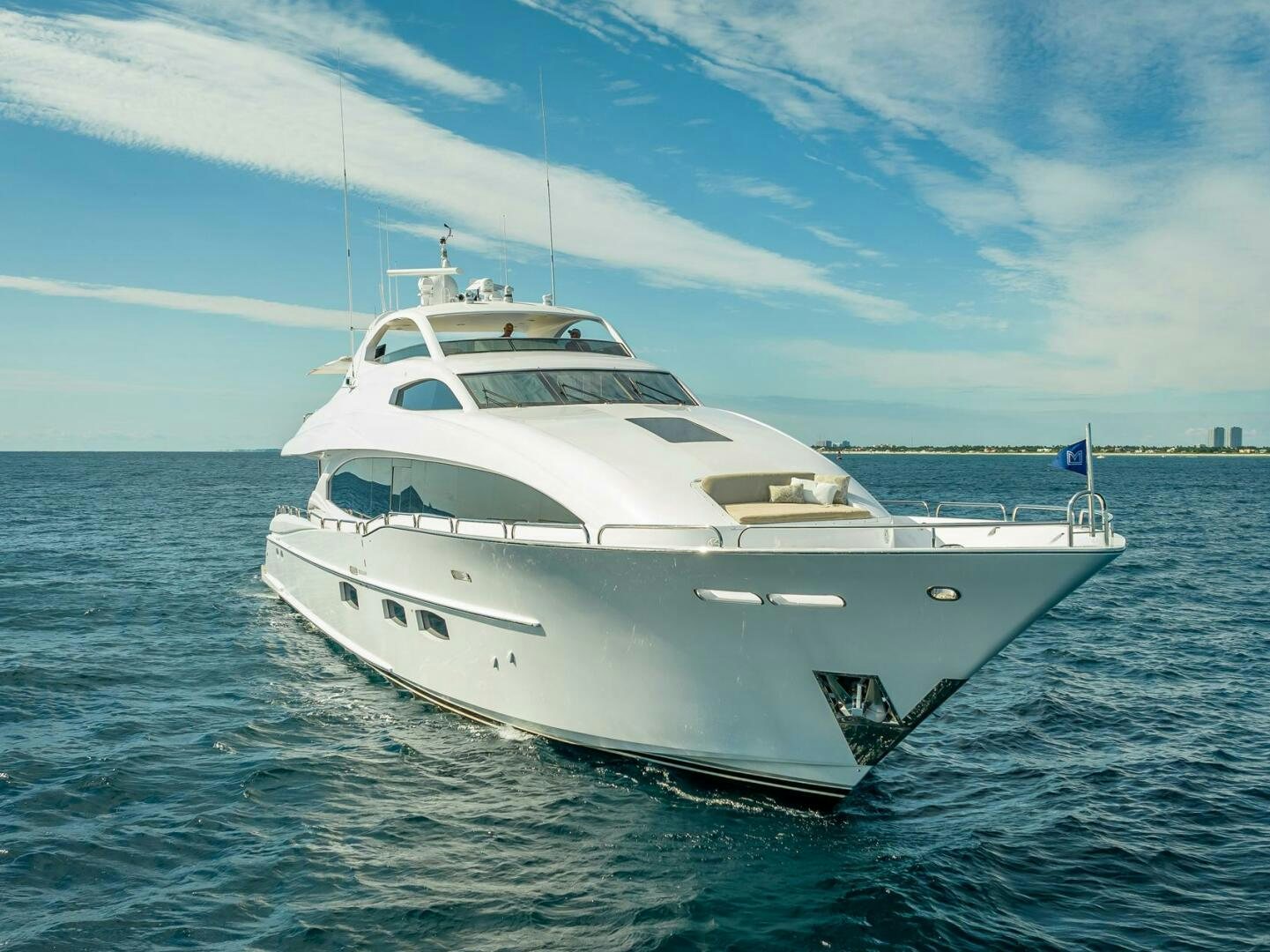 a white yacht on the water aboard SERENITY Yacht for Sale