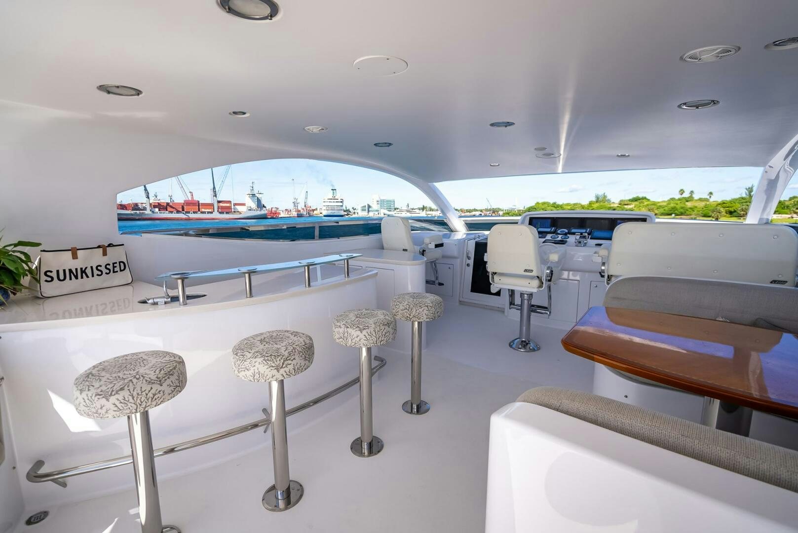 a room with chairs and tables aboard SERENITY Yacht for Sale
