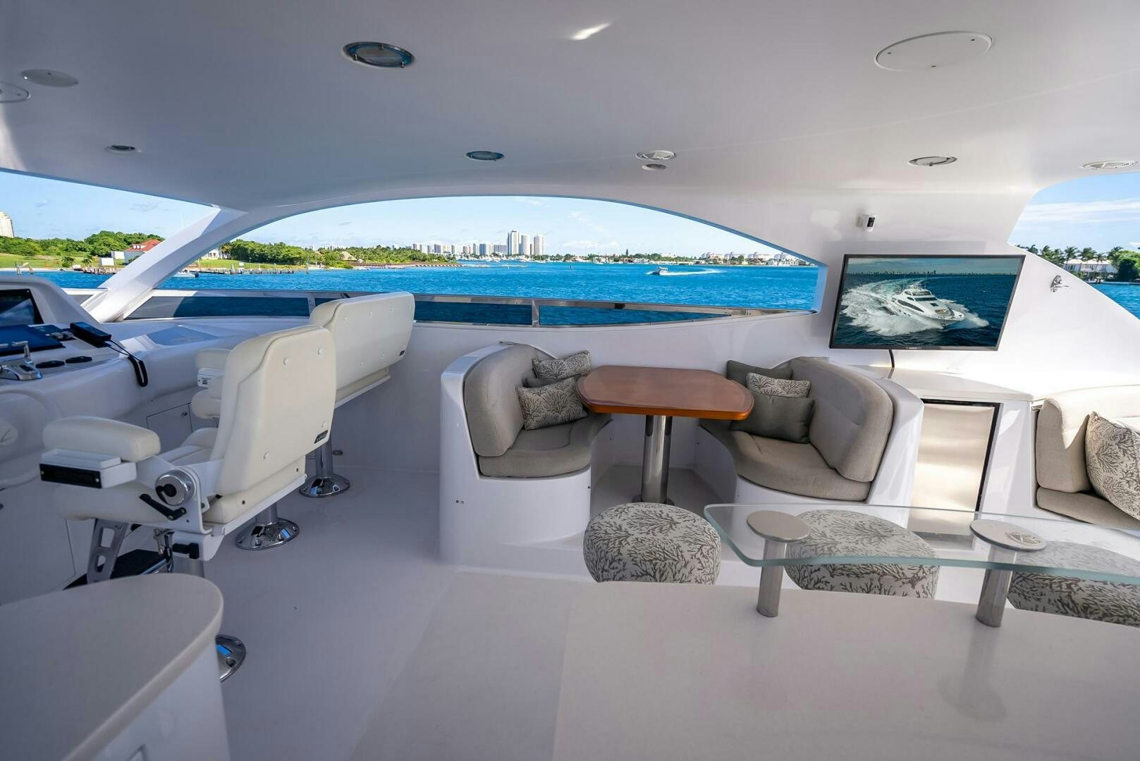 a living room with a pool aboard SERENITY Yacht for Sale