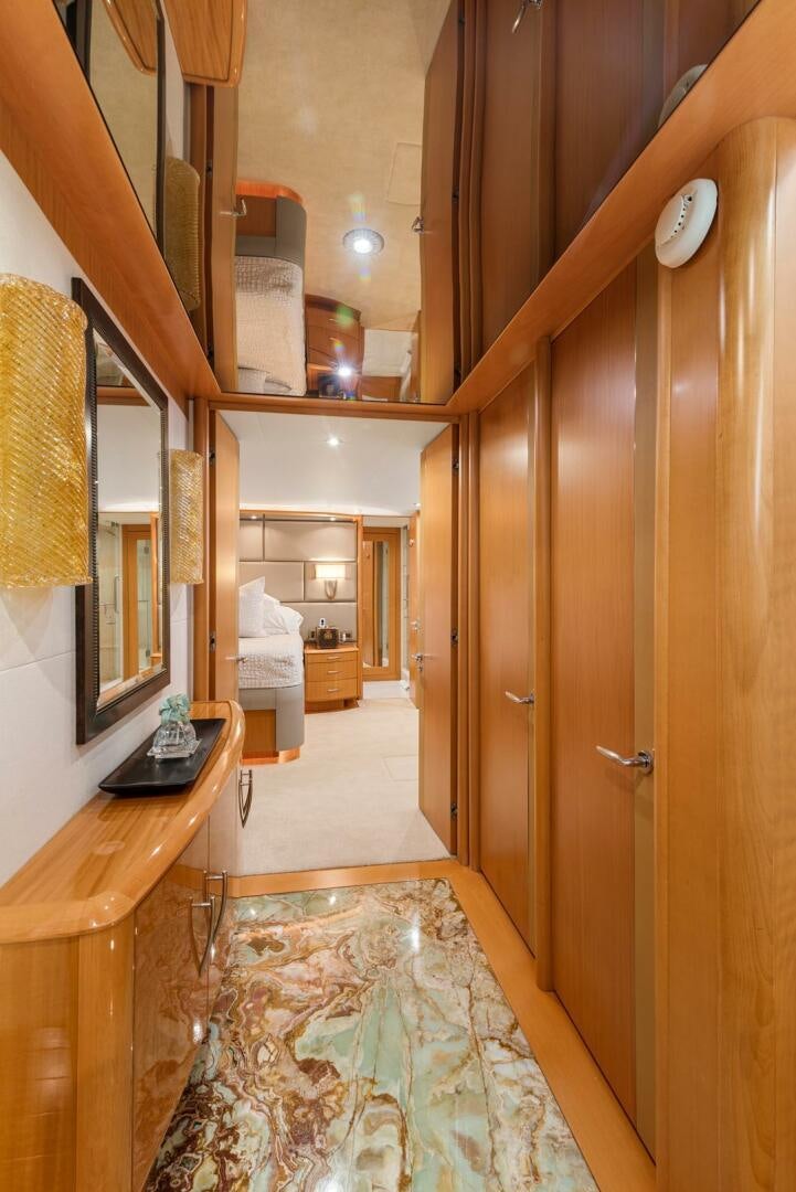 a wood door in a room aboard SERENITY Yacht for Sale