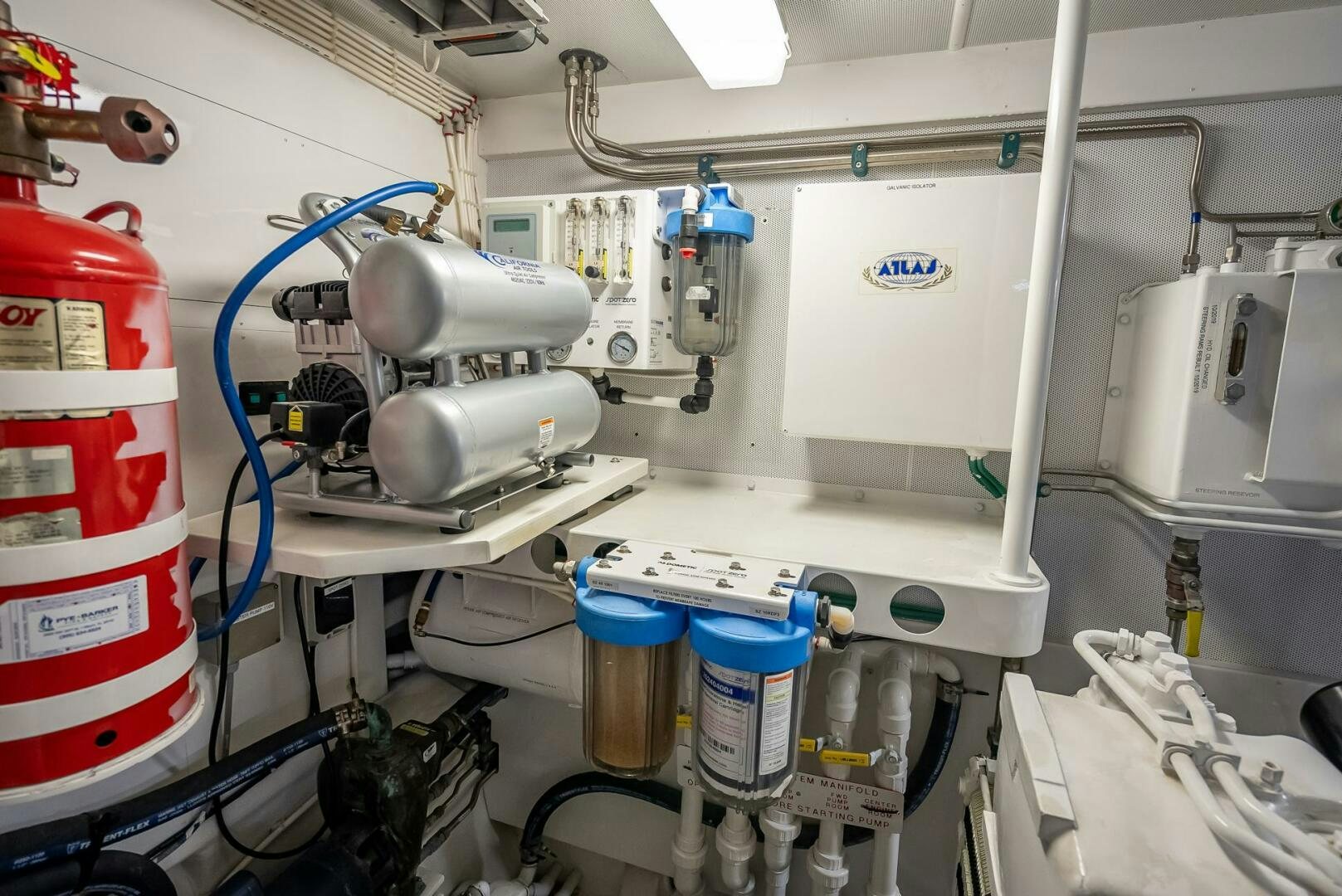 a room with several machines aboard SERENITY Yacht for Sale