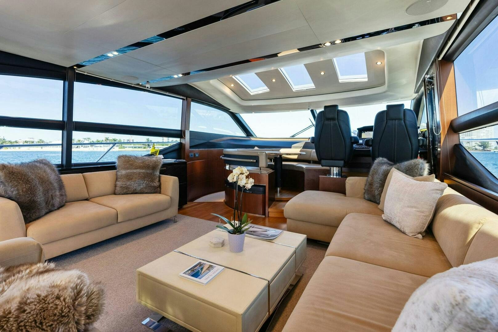 a living room with a large window aboard WOODY Yacht for Sale