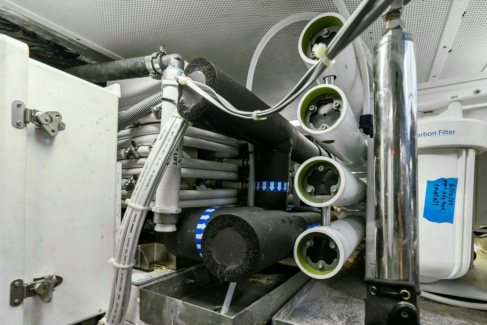 a machine with a large metal pipe aboard WOODY Yacht for Sale