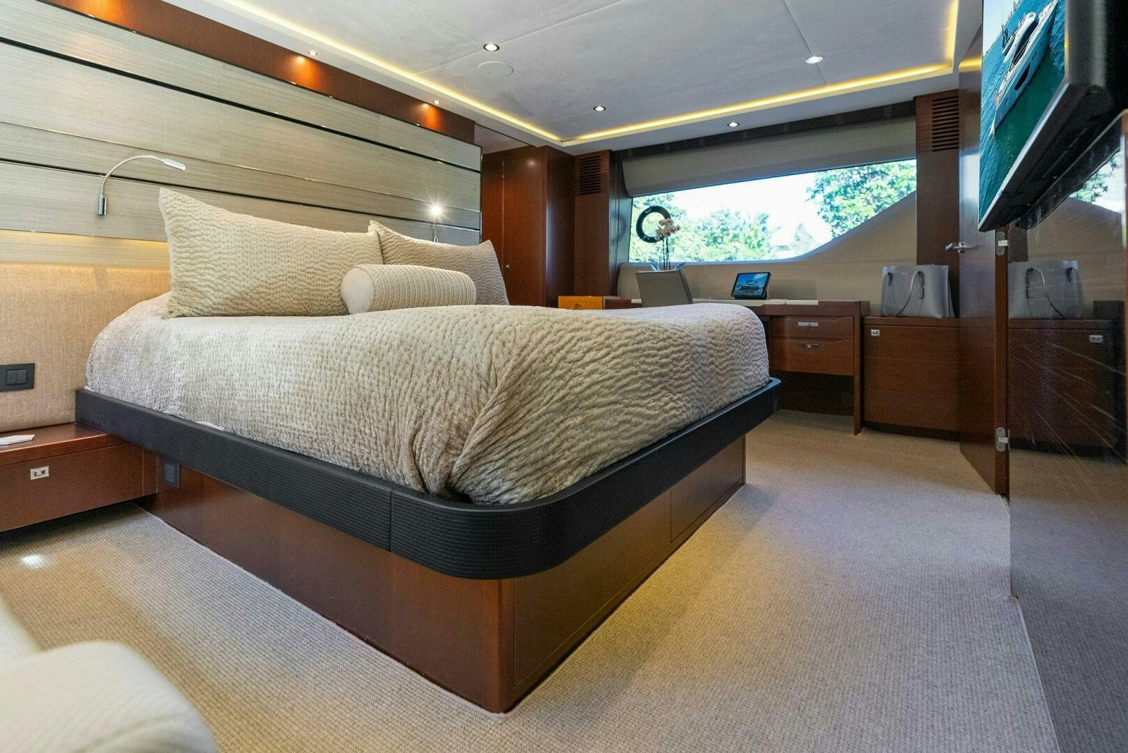 a bed in a room aboard WOODY Yacht for Sale