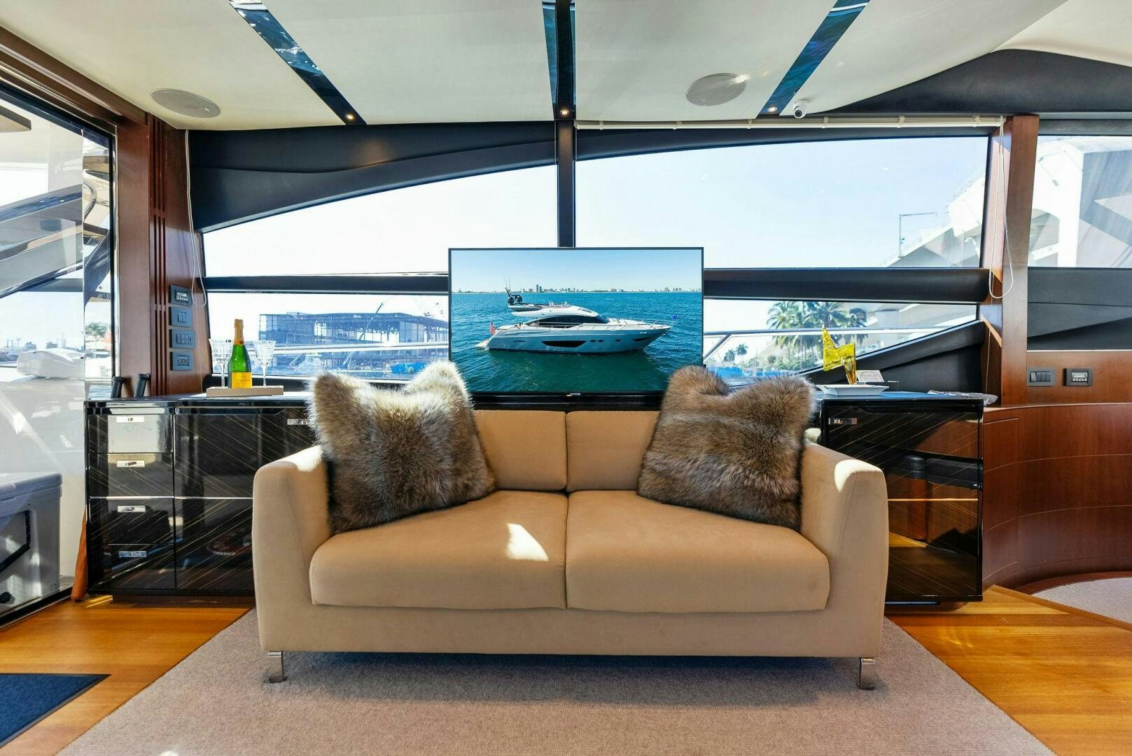 a couch in a living room aboard WOODY Yacht for Sale