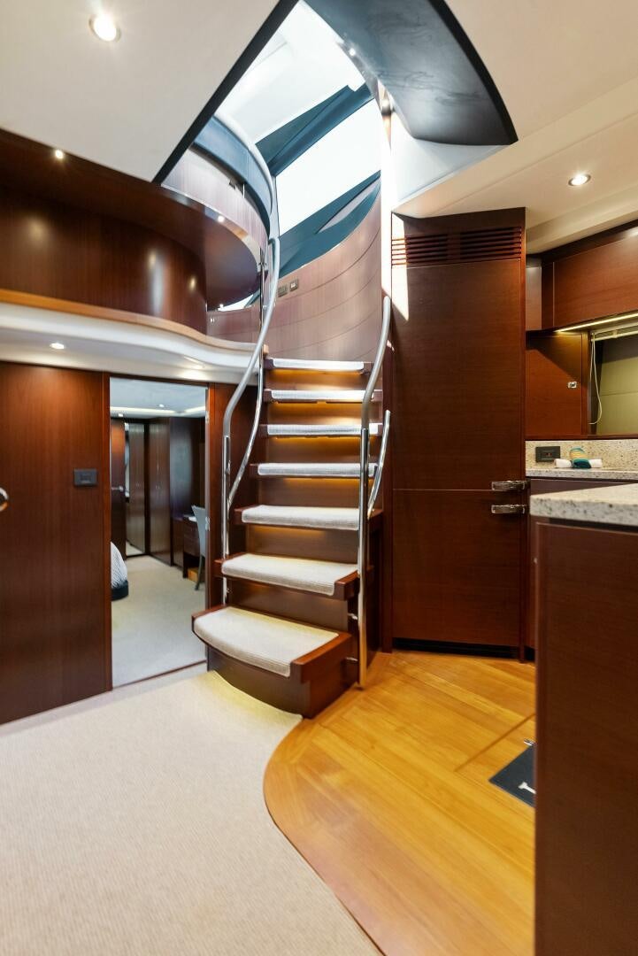 a staircase in a house aboard WOODY Yacht for Sale