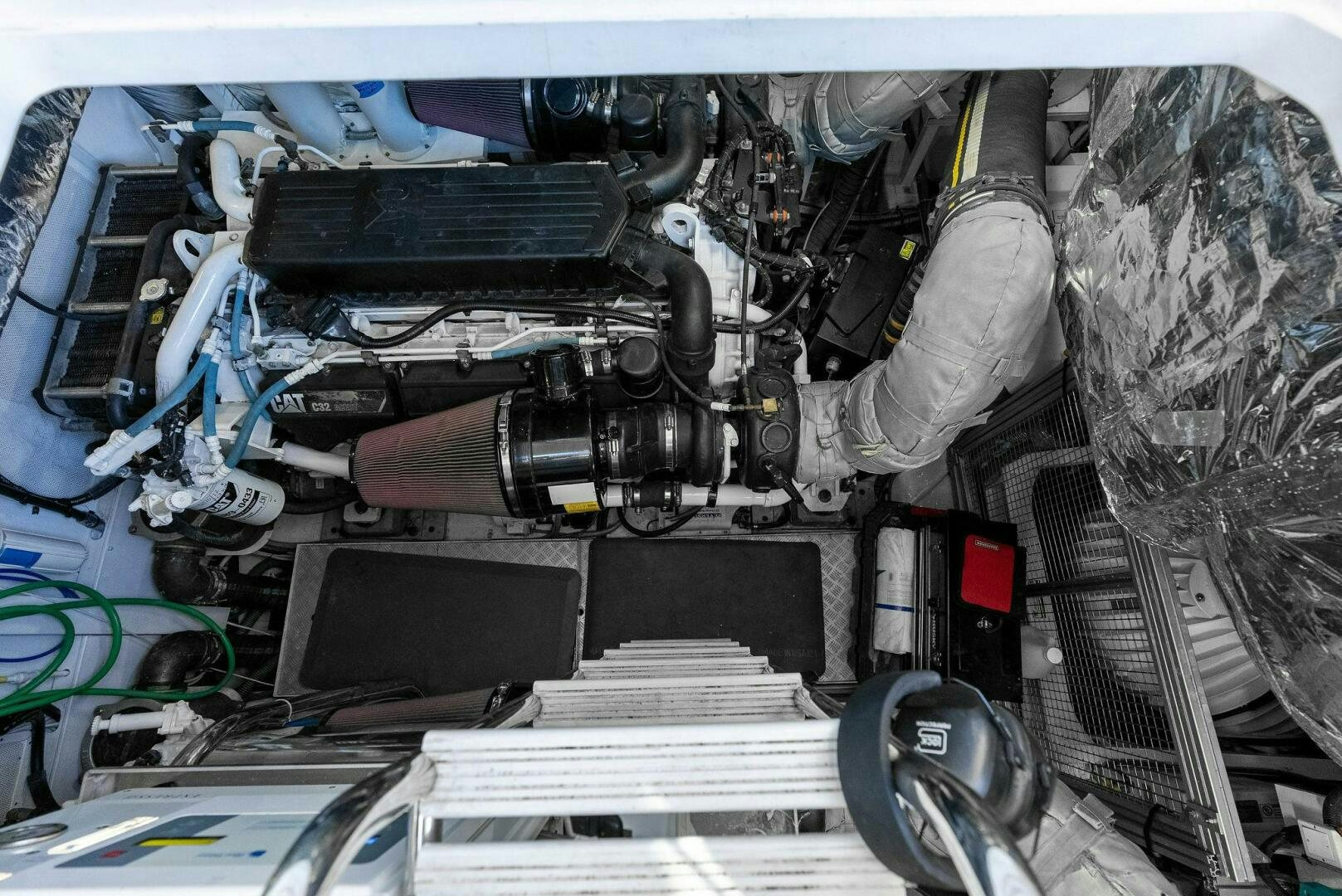 a car engine with a blue hood aboard WOODY Yacht for Sale