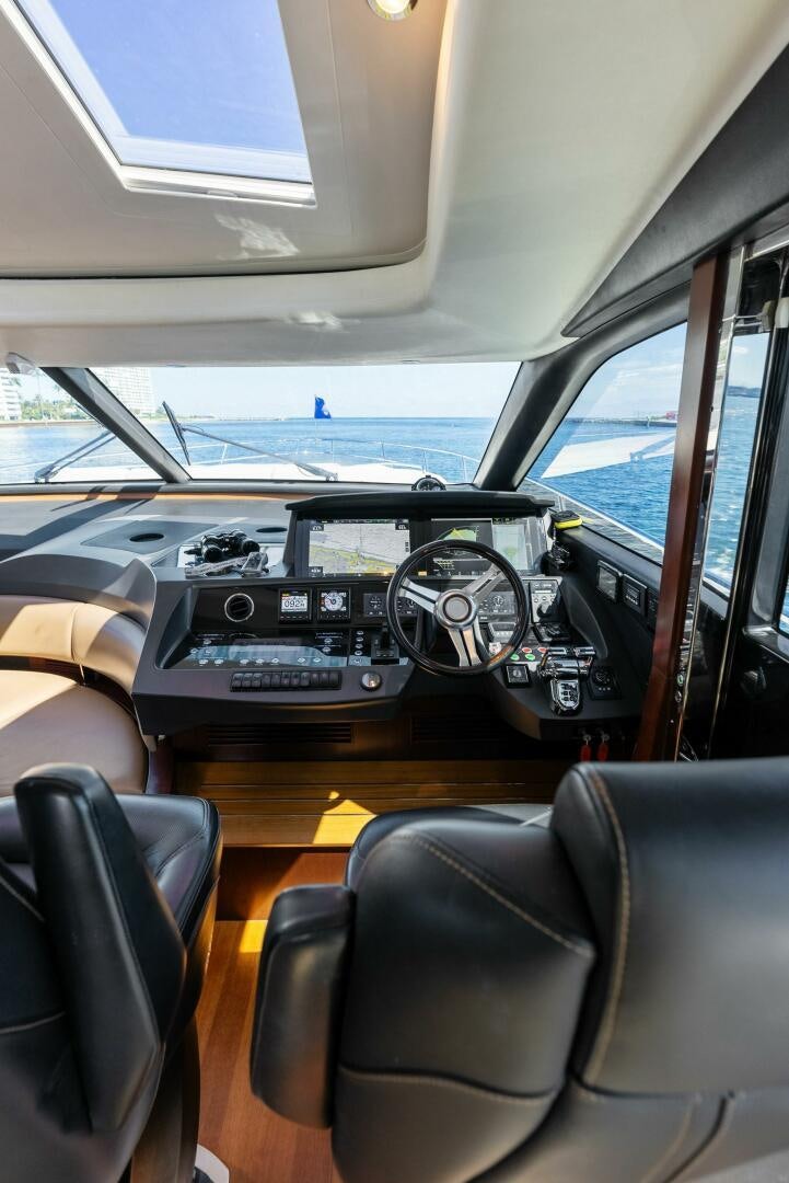 inside of a car aboard WOODY Yacht for Sale