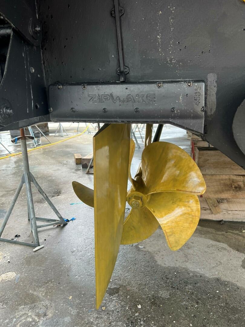 a large yellow object with a hole in it aboard WOODY Yacht for Sale