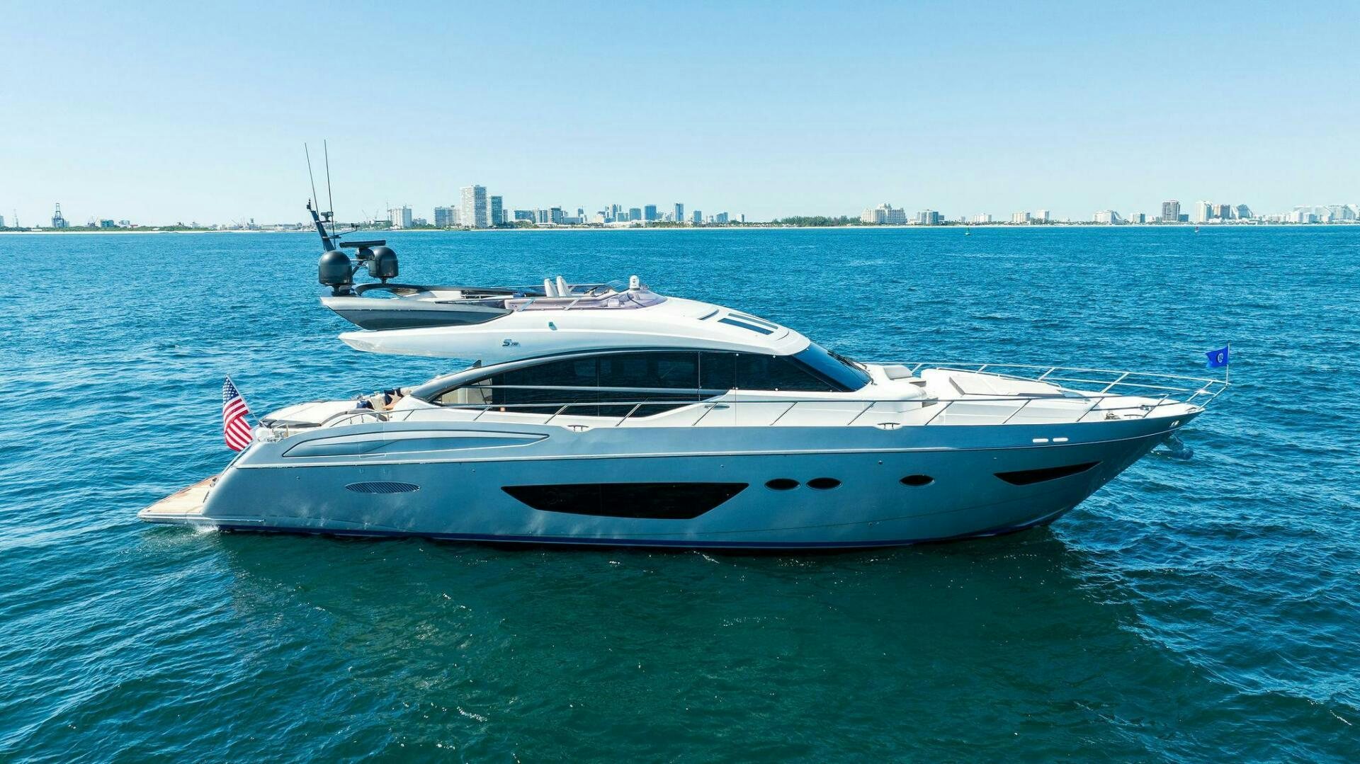 a white yacht in the water aboard WOODY Yacht for Sale