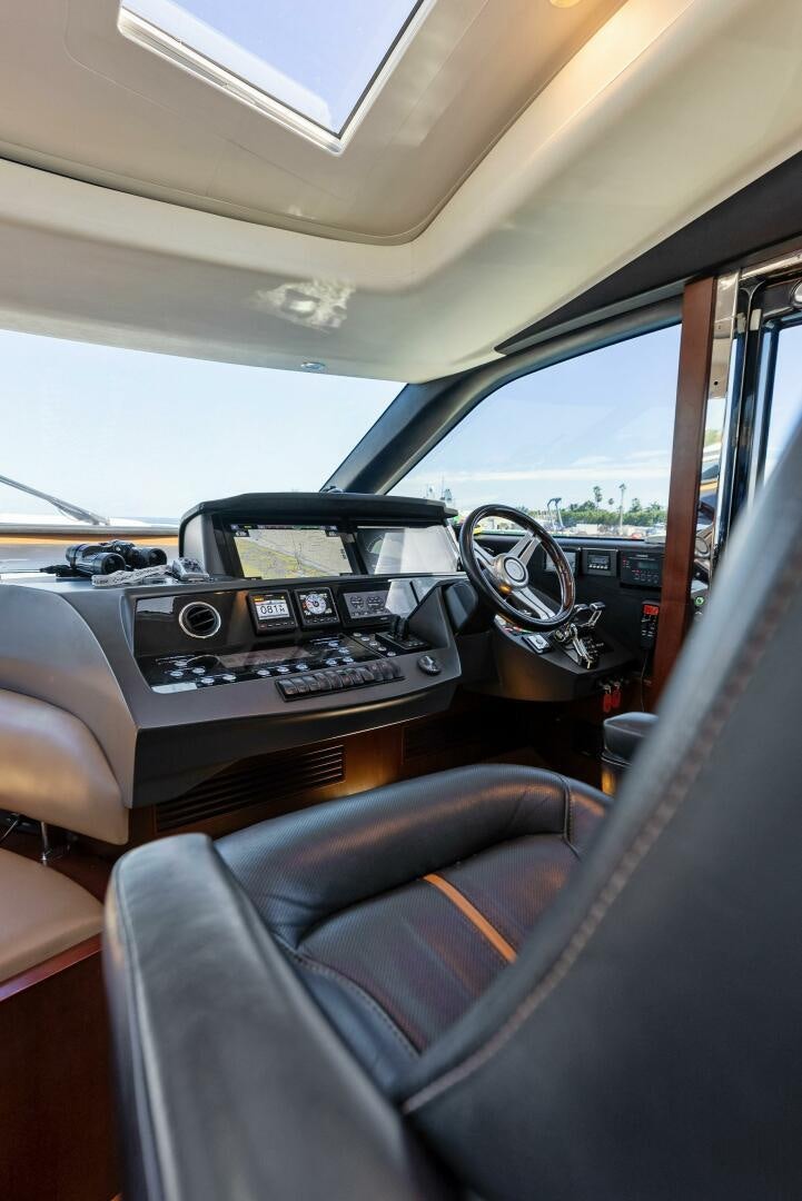 the interior of a car aboard WOODY Yacht for Sale
