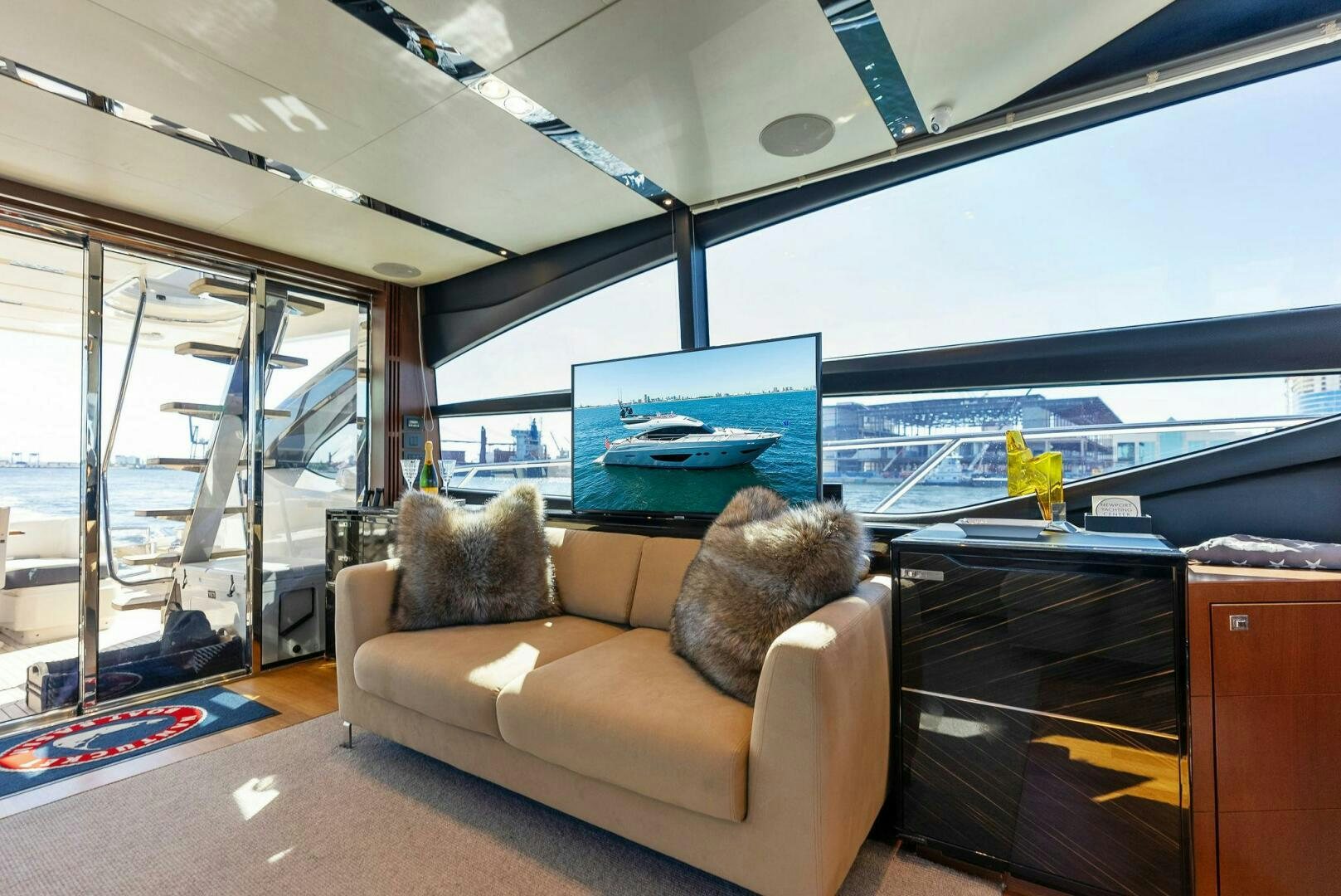 a living room with a large window aboard WOODY Yacht for Sale