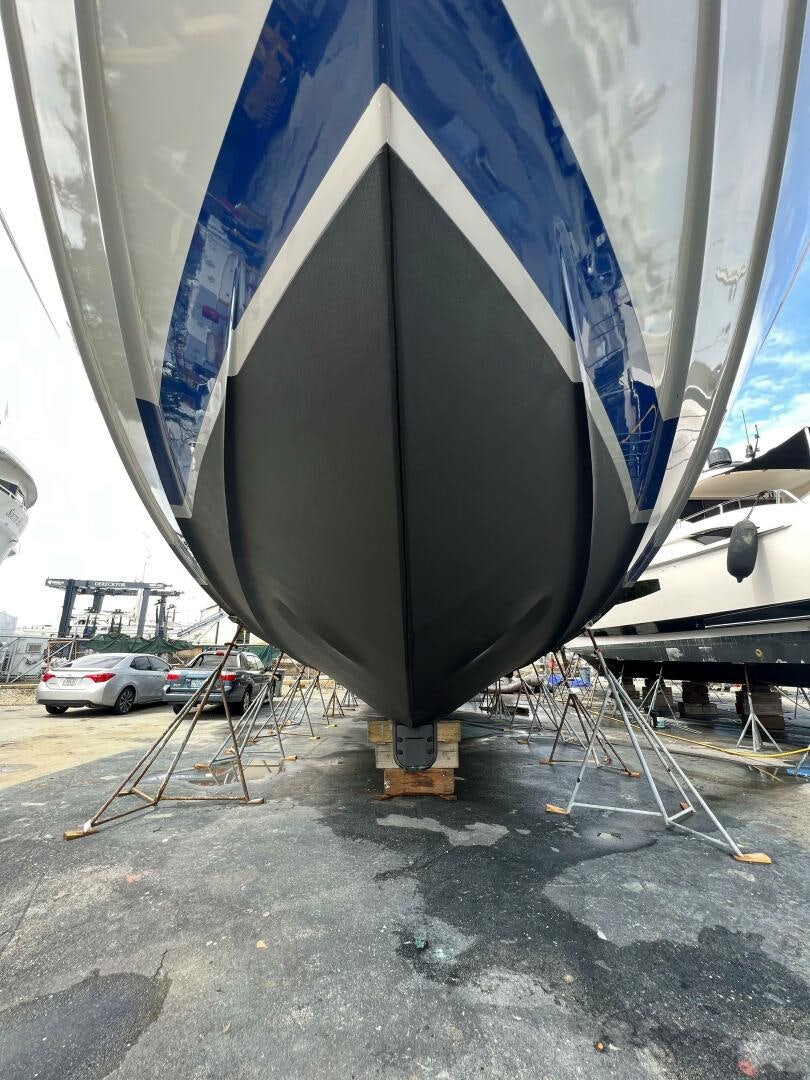 a large sailboat on a dock aboard WOODY Yacht for Sale