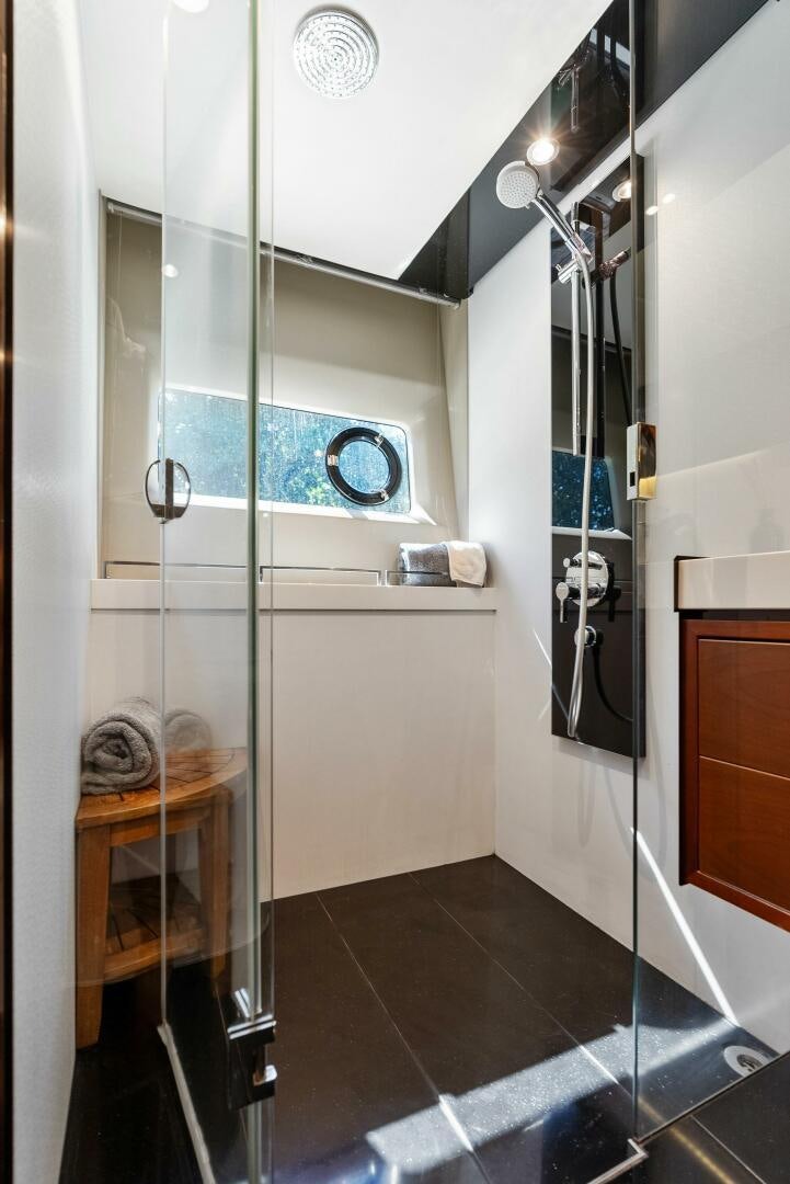 a shower unit in a bathroom aboard WOODY Yacht for Sale