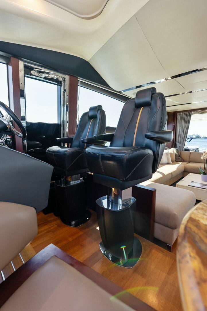 a black seat on a bus aboard WOODY Yacht for Sale