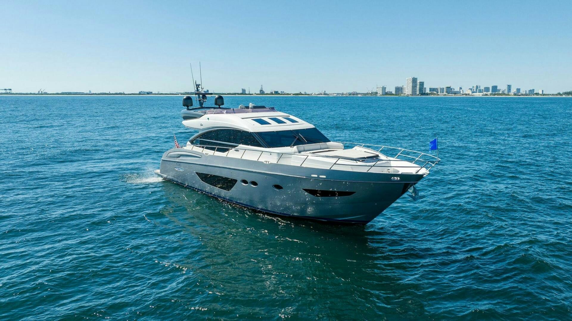 a white yacht in the water aboard WOODY Yacht for Sale