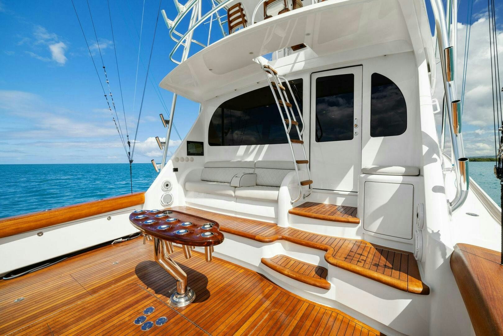 a boat on a deck aboard PLAN B Yacht for Sale