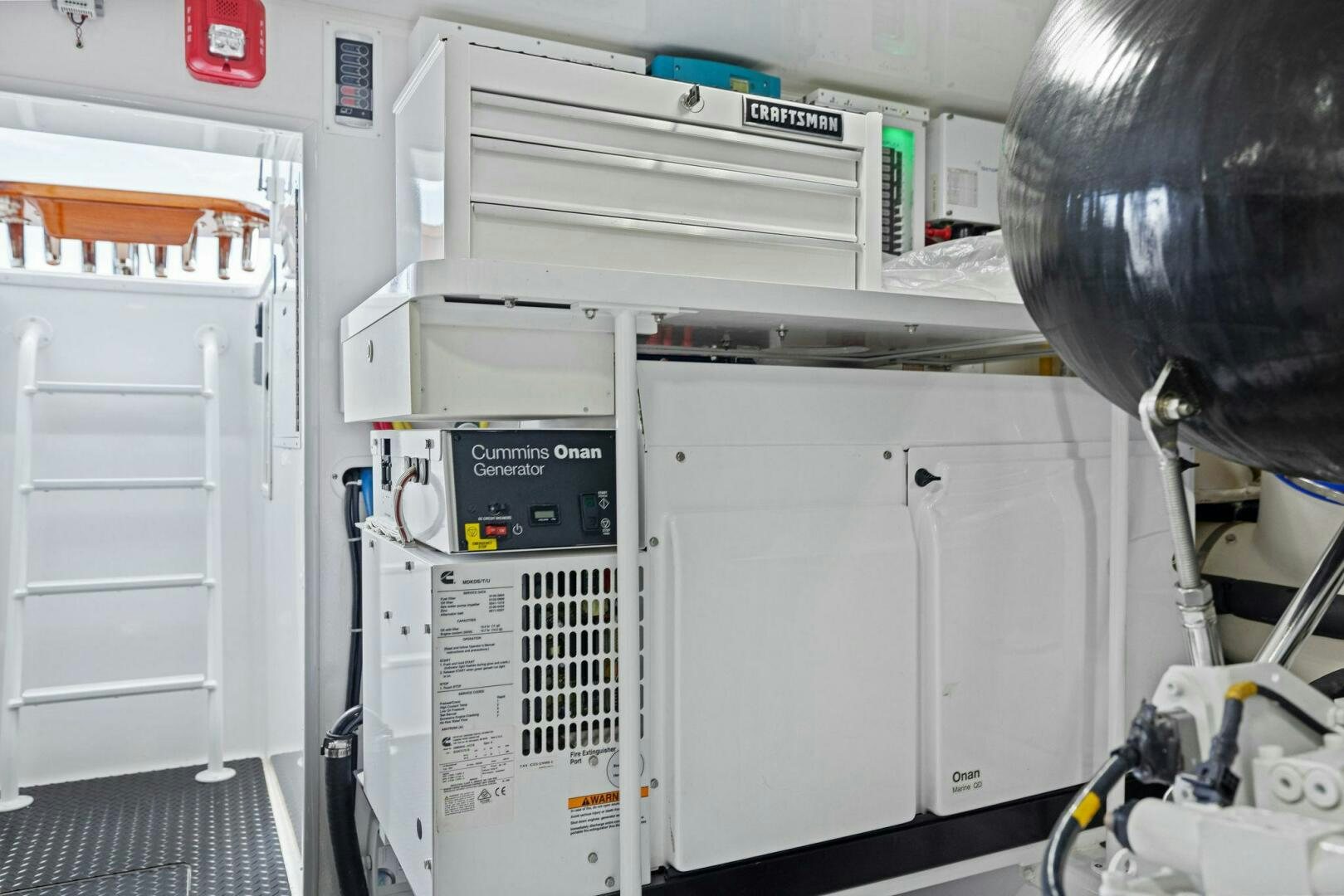 a machine with a large piece of equipment on it aboard PLAN B Yacht for Sale