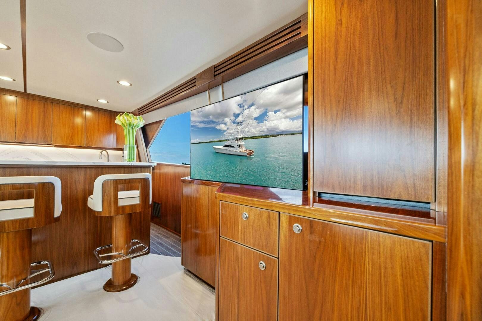 a bathroom with a large mirror aboard PLAN B Yacht for Sale