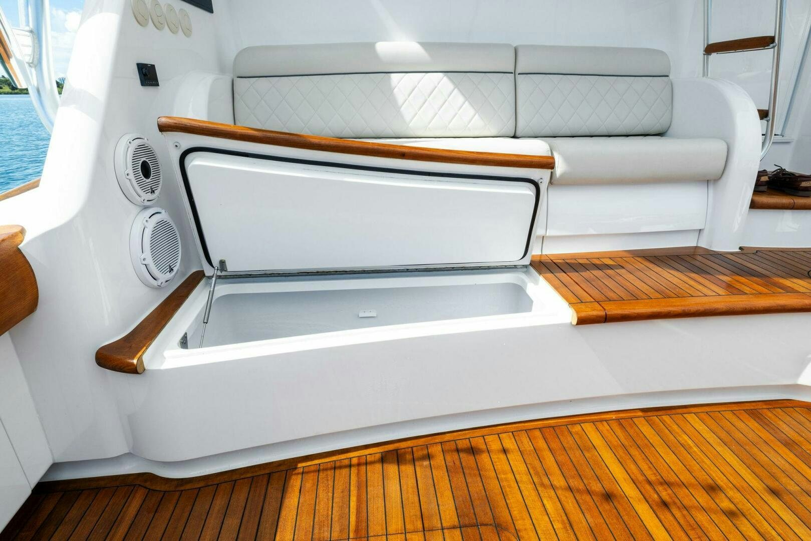 a white rectangular object with a wood handle aboard PLAN B Yacht for Sale