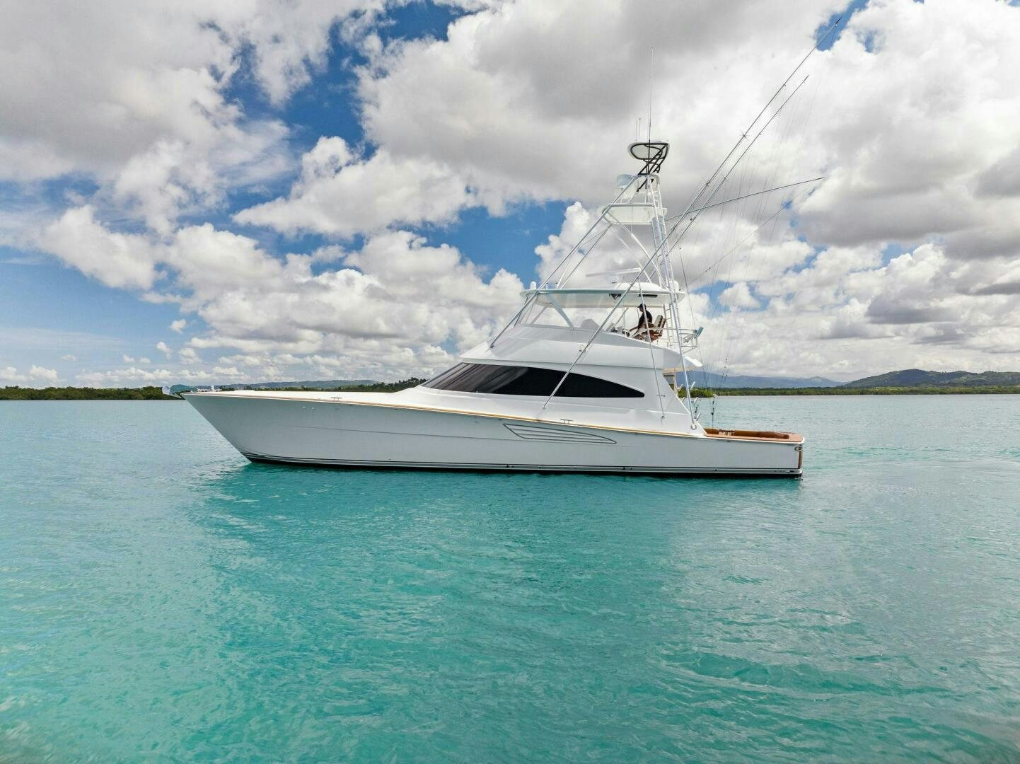 a boat on the water aboard PLAN B Yacht for Sale