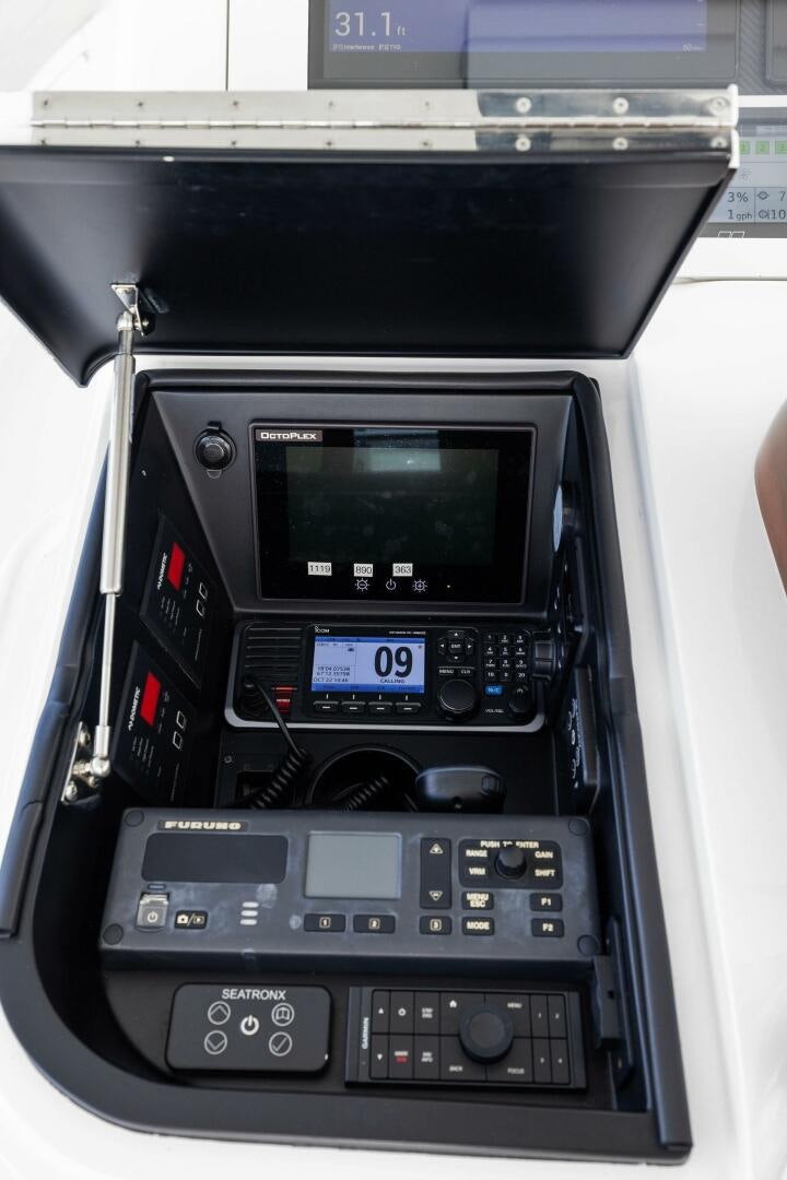 a black and silver electronic device aboard PLAN B Yacht for Sale