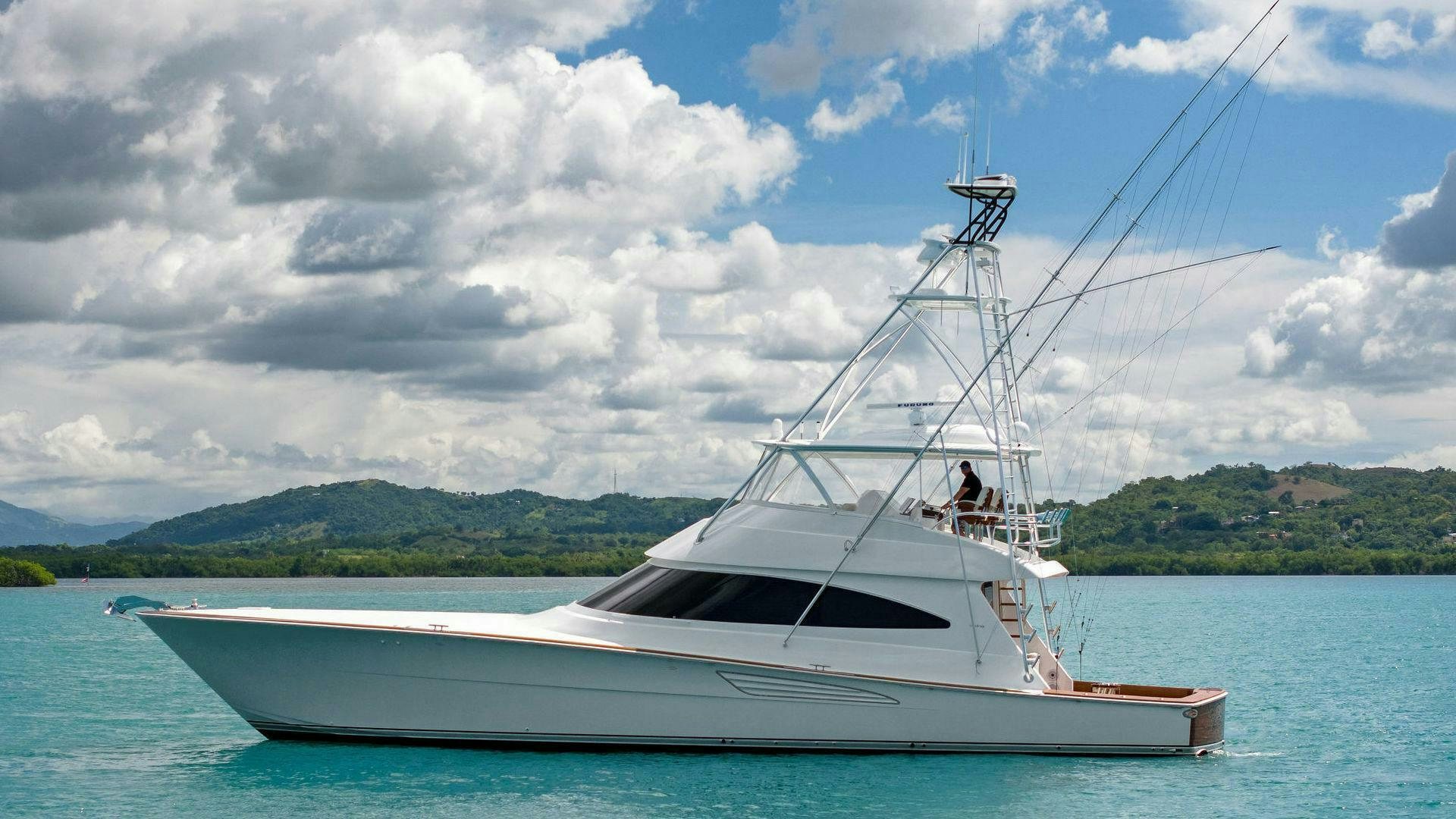 a boat on the water aboard PLAN B Yacht for Sale